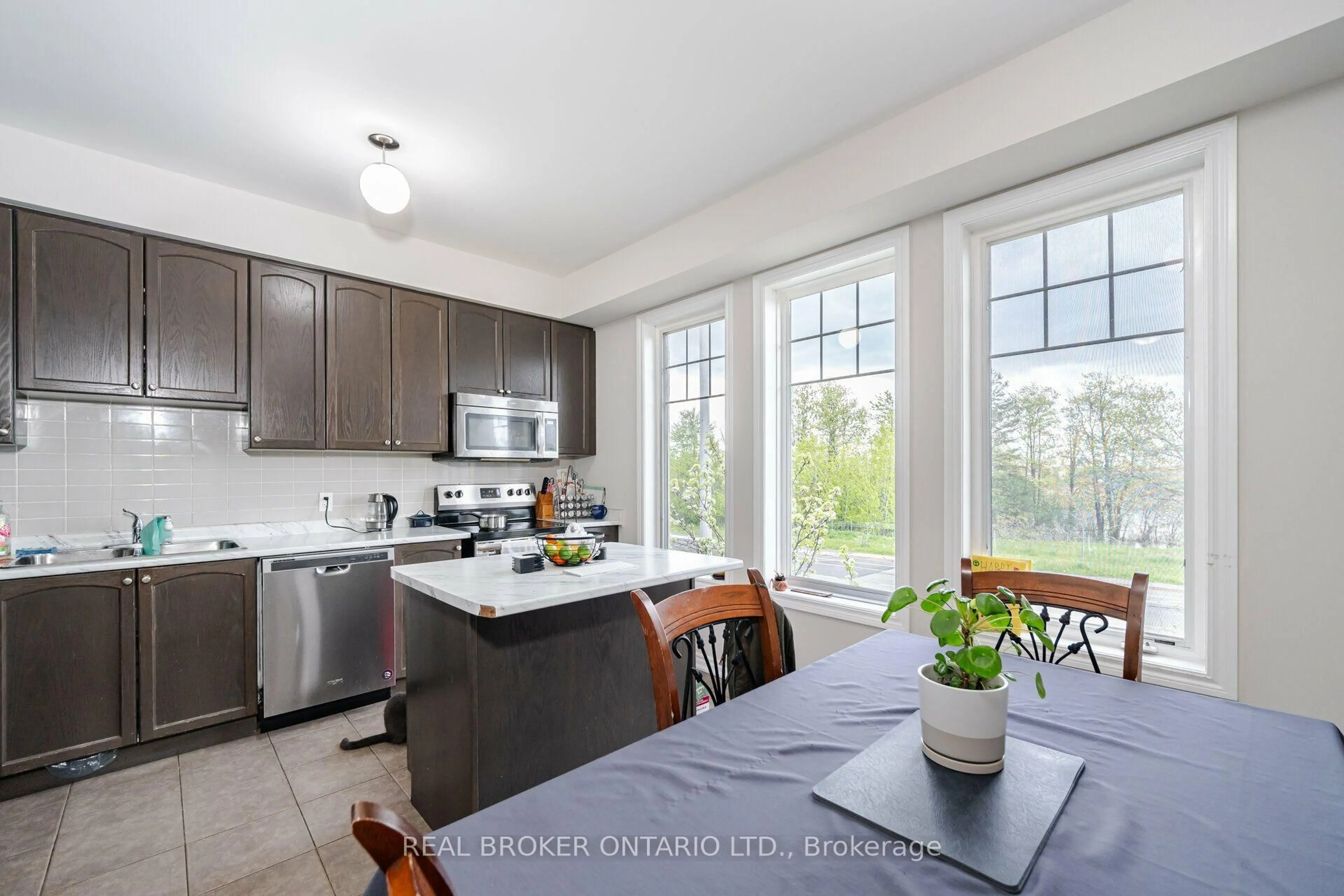 Open concept kitchen, ceramic/tile floor for 50 Magdalene Cres, Brampton Ontario L6Z 0G8