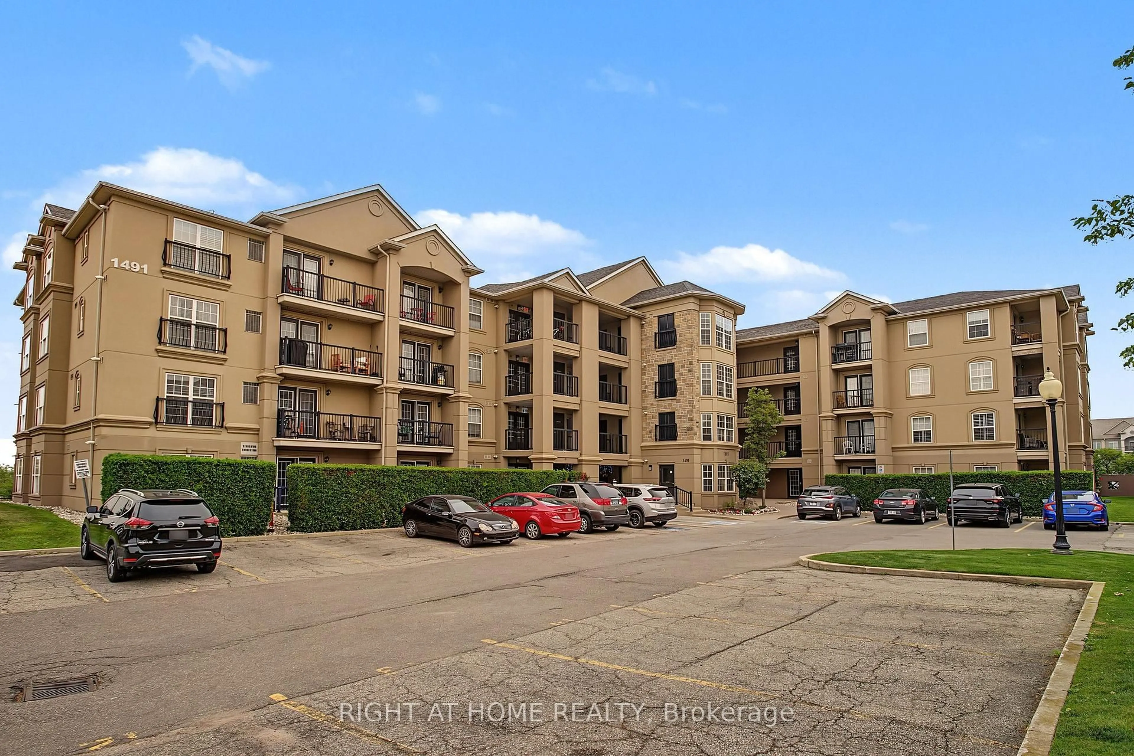 A pic from outside/outdoor area/front of a property/back of a property/a pic from drone, unknown for 1491 Maple Ave #111, Milton Ontario L9T 0B8