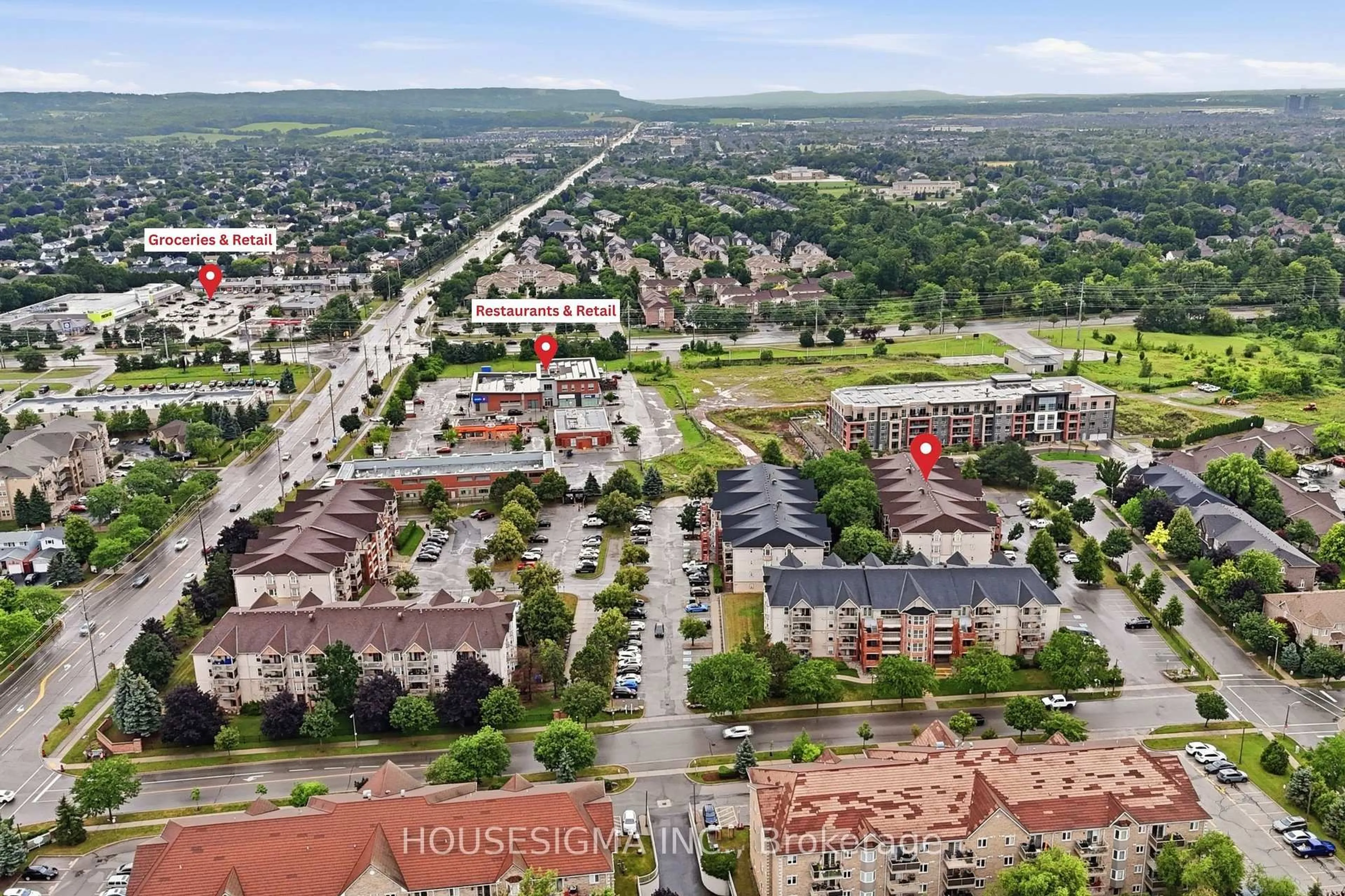 A pic from outside/outdoor area/front of a property/back of a property/a pic from drone, street for 4025 Kilmer Dr #203, Burlington Ontario L7M 4M5