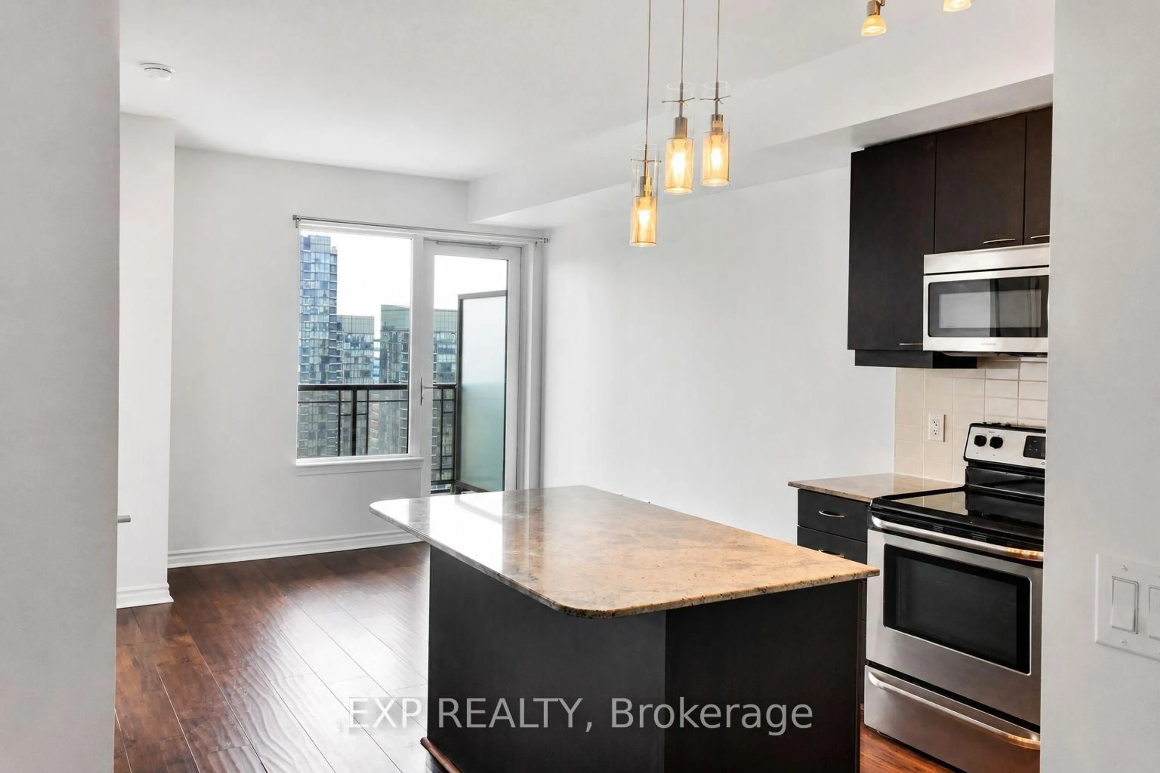 Open concept kitchen, wood/laminate floor for 385 Prince Of Wales Dr #3506, Mississauga Ontario L5B 0C6