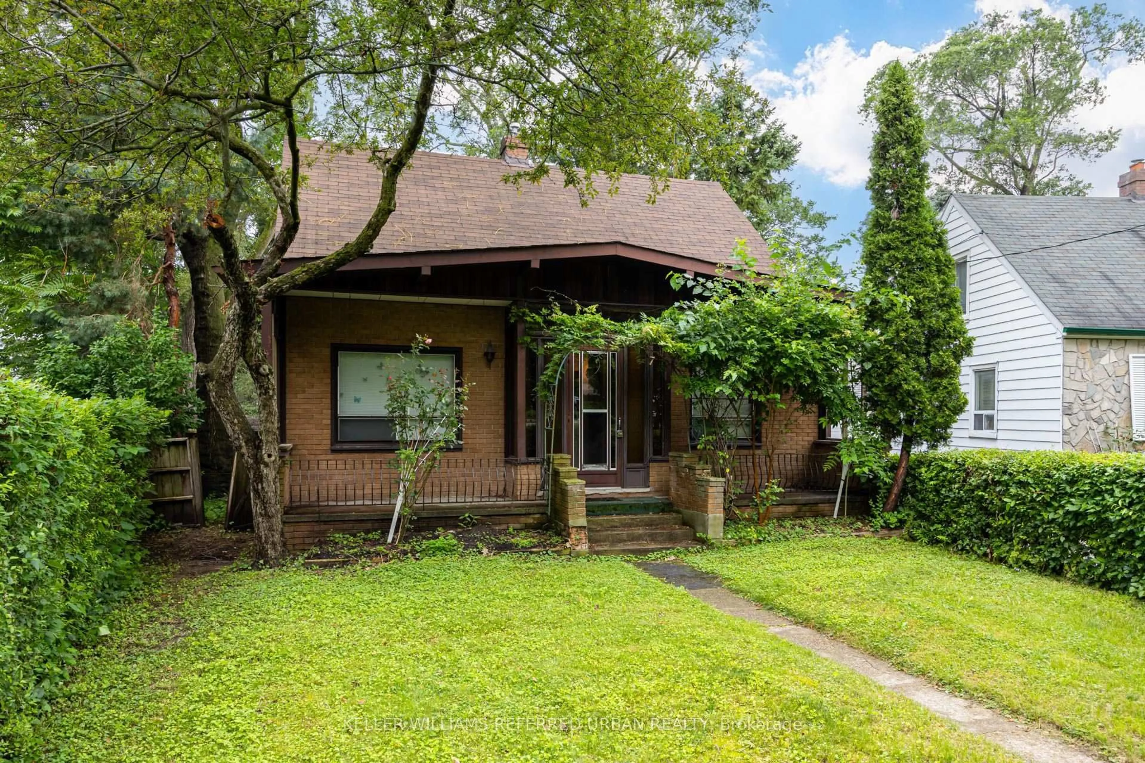 Home with brick exterior material, street for 7 Saunders Cres, Toronto Ontario M8Y 2P7