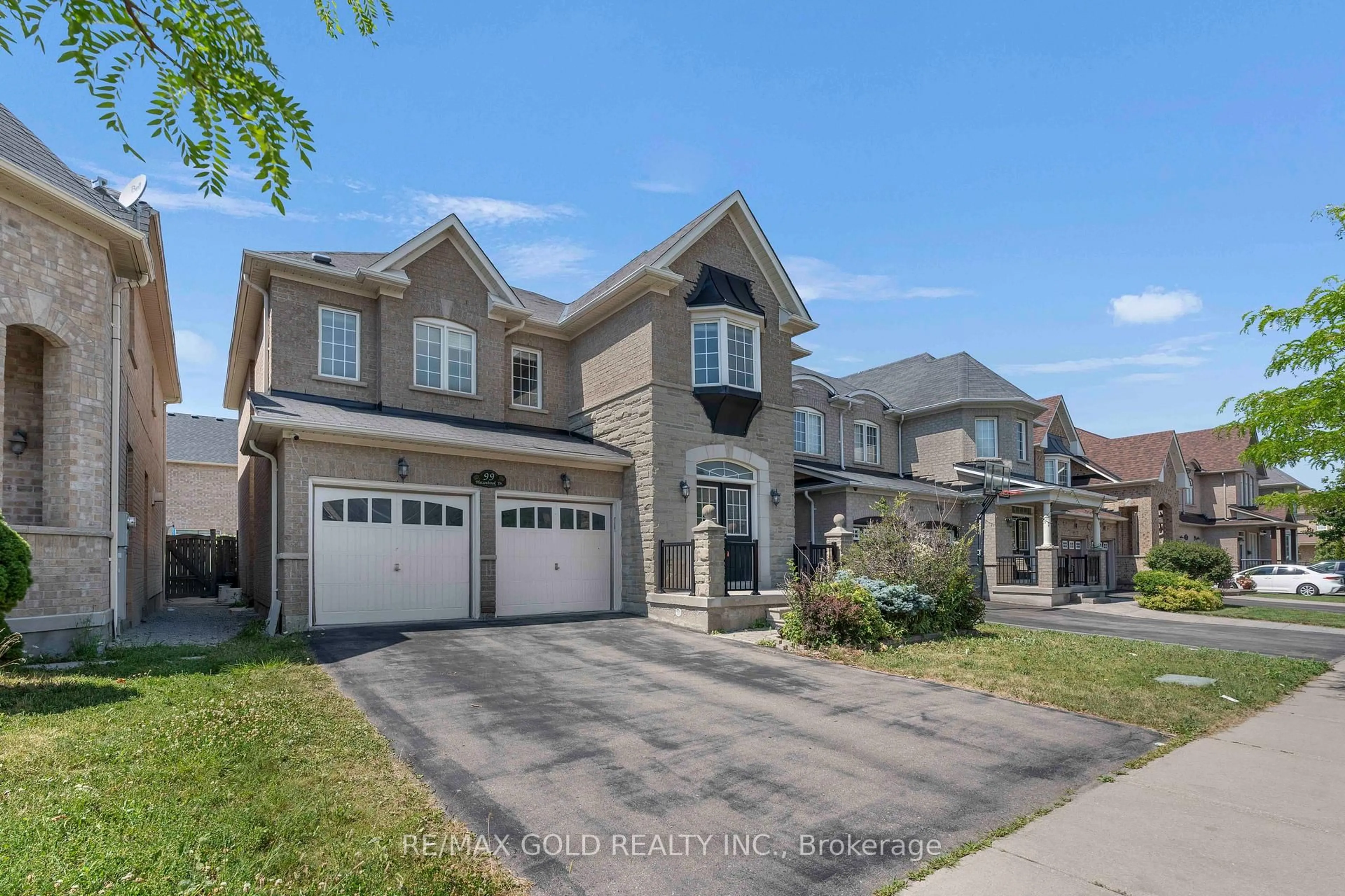 Home with brick exterior material, street for 99 Watsonbrook Dr, Brampton Ontario L6R 0R5