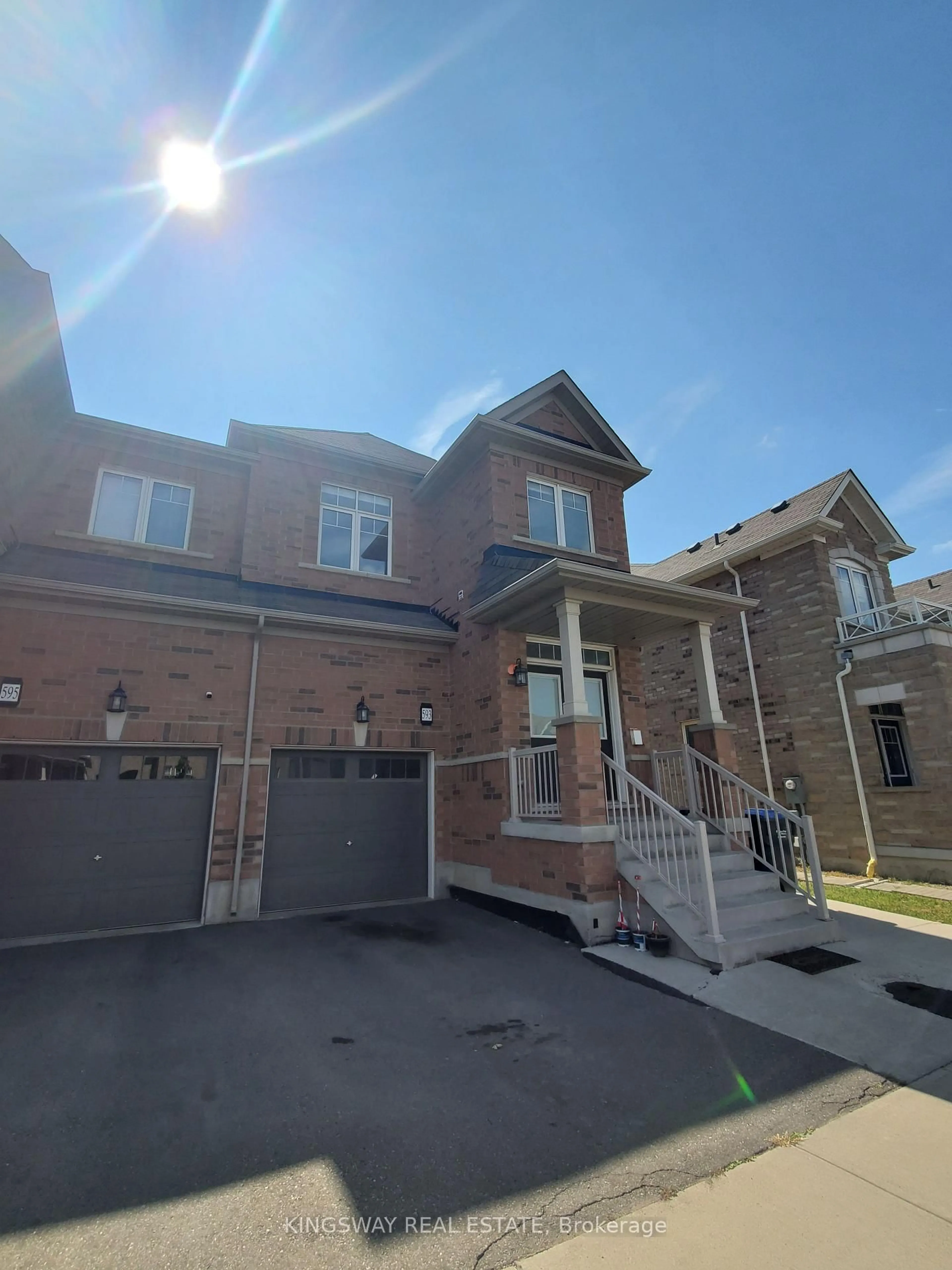 Home with brick exterior material, street for 593 Remembrance Rd, Brampton Ontario L7A 4L2