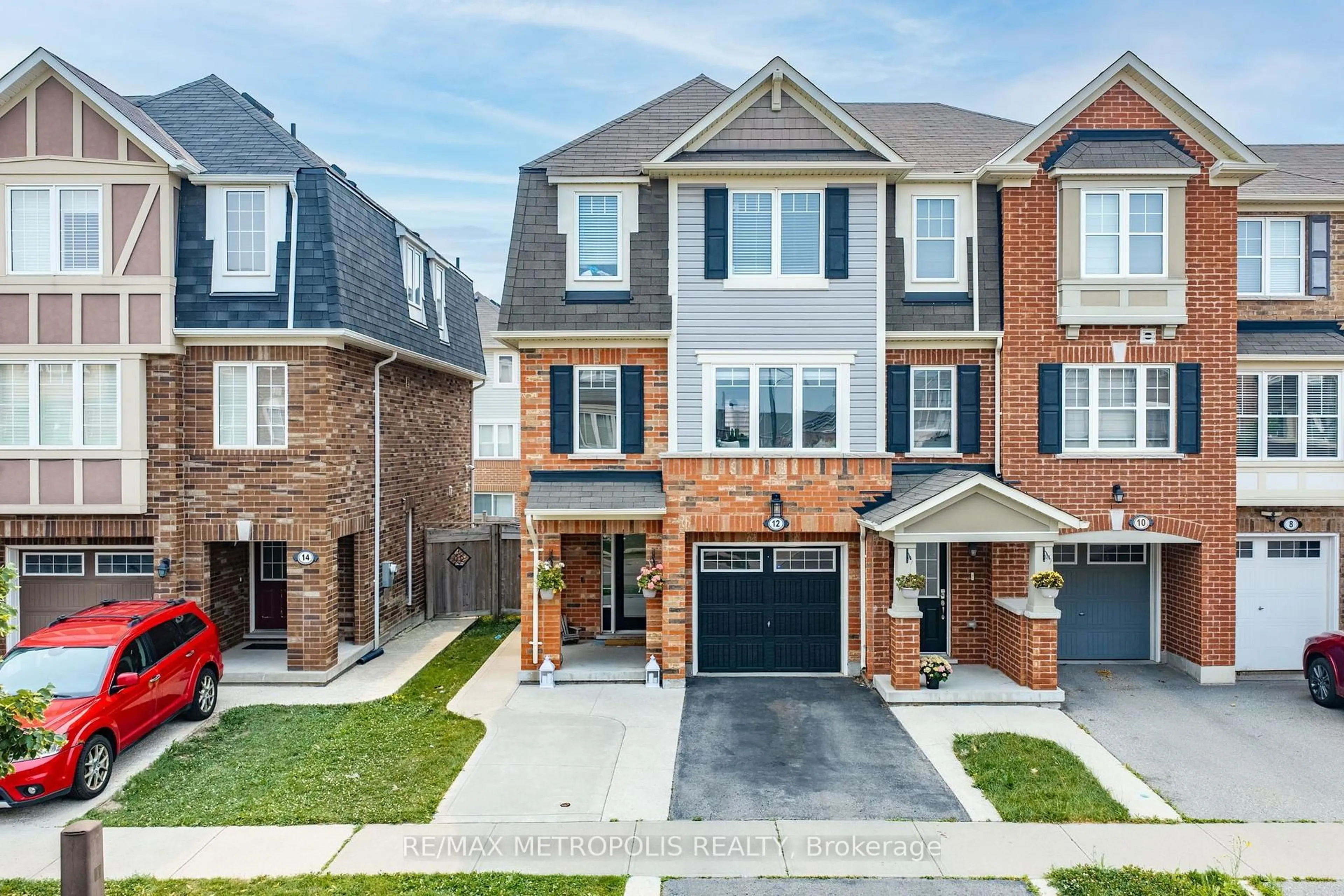 Home with brick exterior material, street for 12 AFFLECK Rd, Brampton Ontario L7A 3Y8