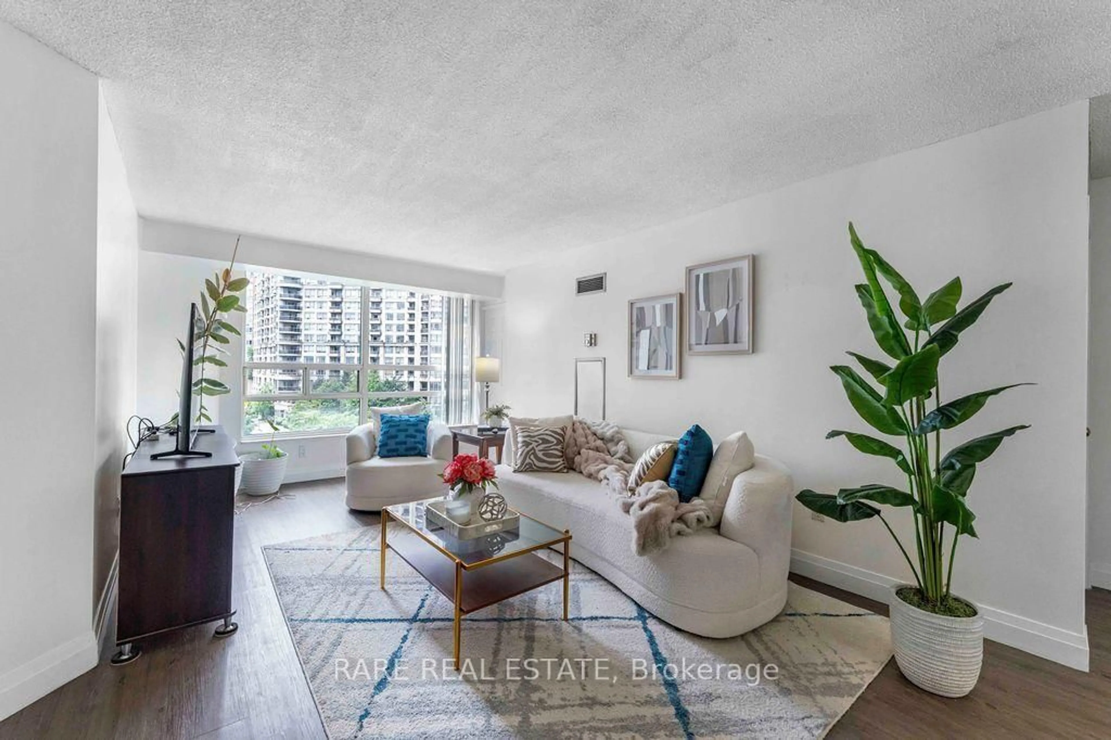 Living room with furniture, unknown for 250 Webb Dr #513, Mississauga Ontario L5B 3Z4
