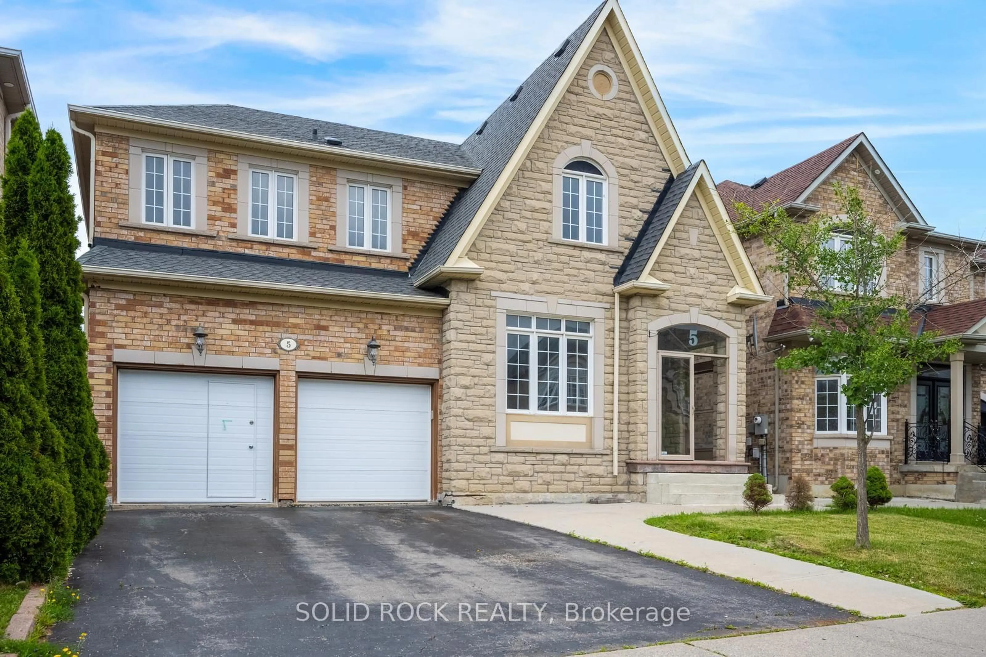 Home with brick exterior material, street for 5 Freshspring Dr, Brampton Ontario L6R 3H6