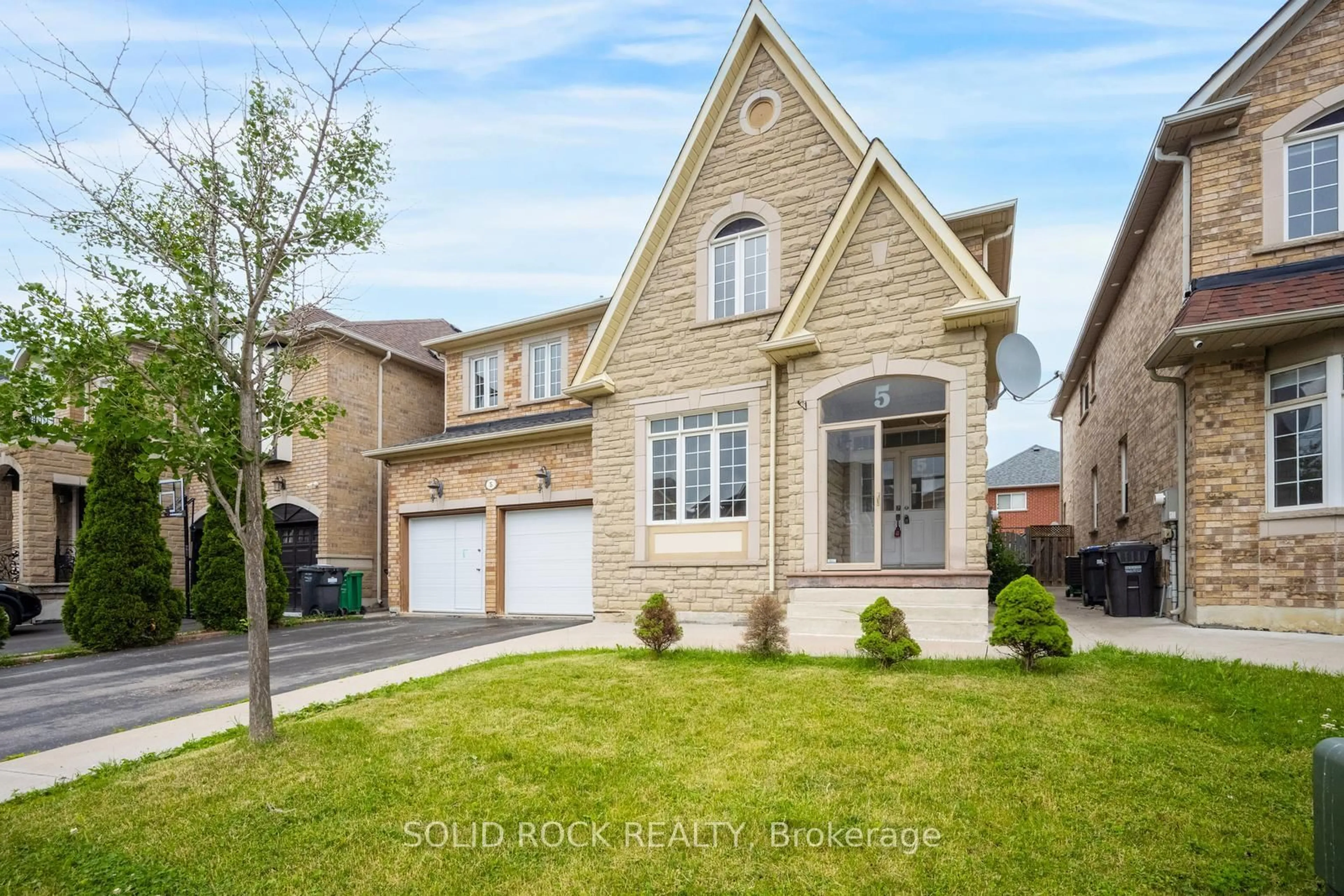 Home with brick exterior material, street for 5 Freshspring Dr, Brampton Ontario L6R 3H6
