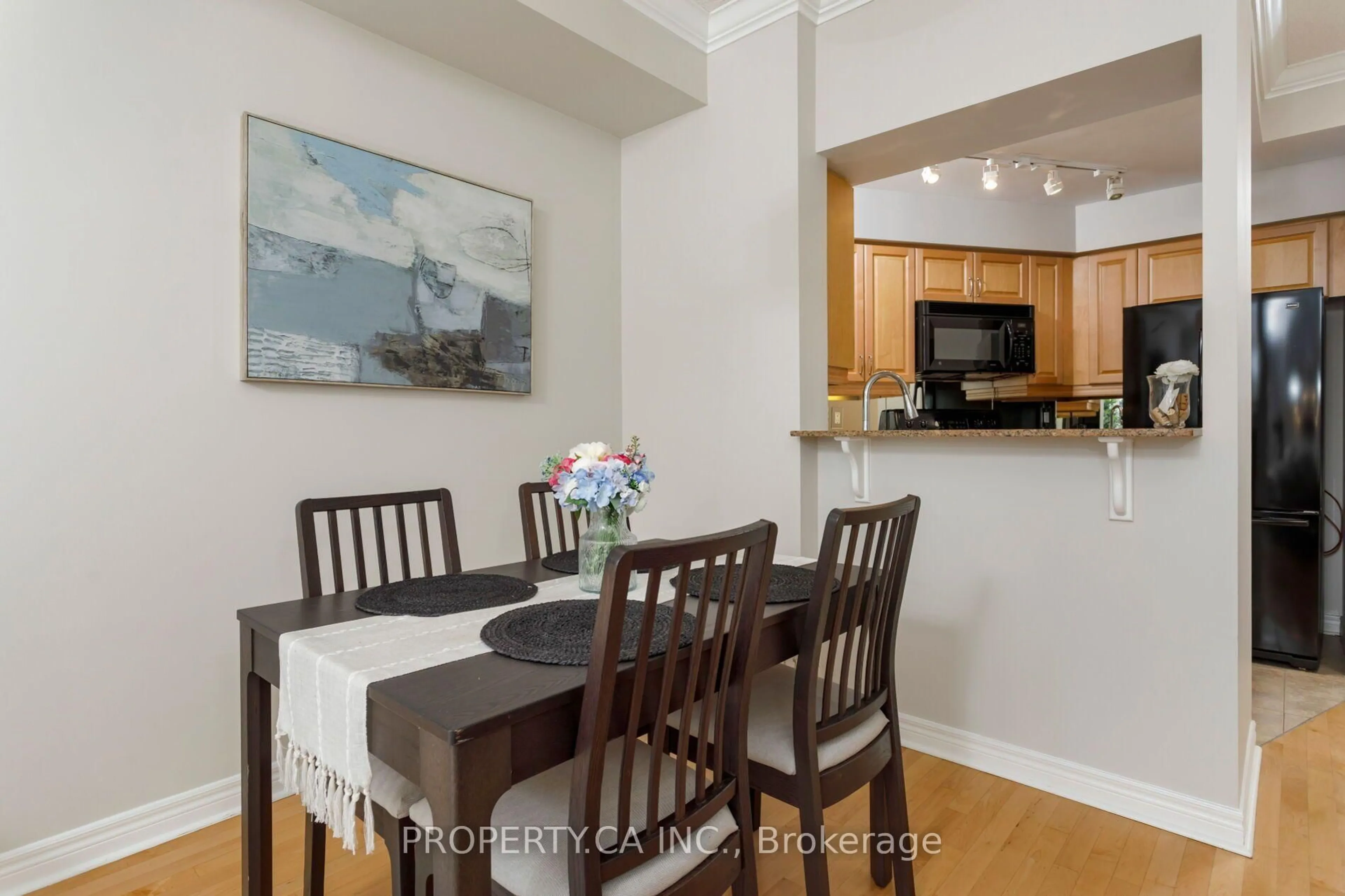 Dining room, wood/laminate floor for 40 Old Mill Rd #204, Oakville Ontario L6J 7W2