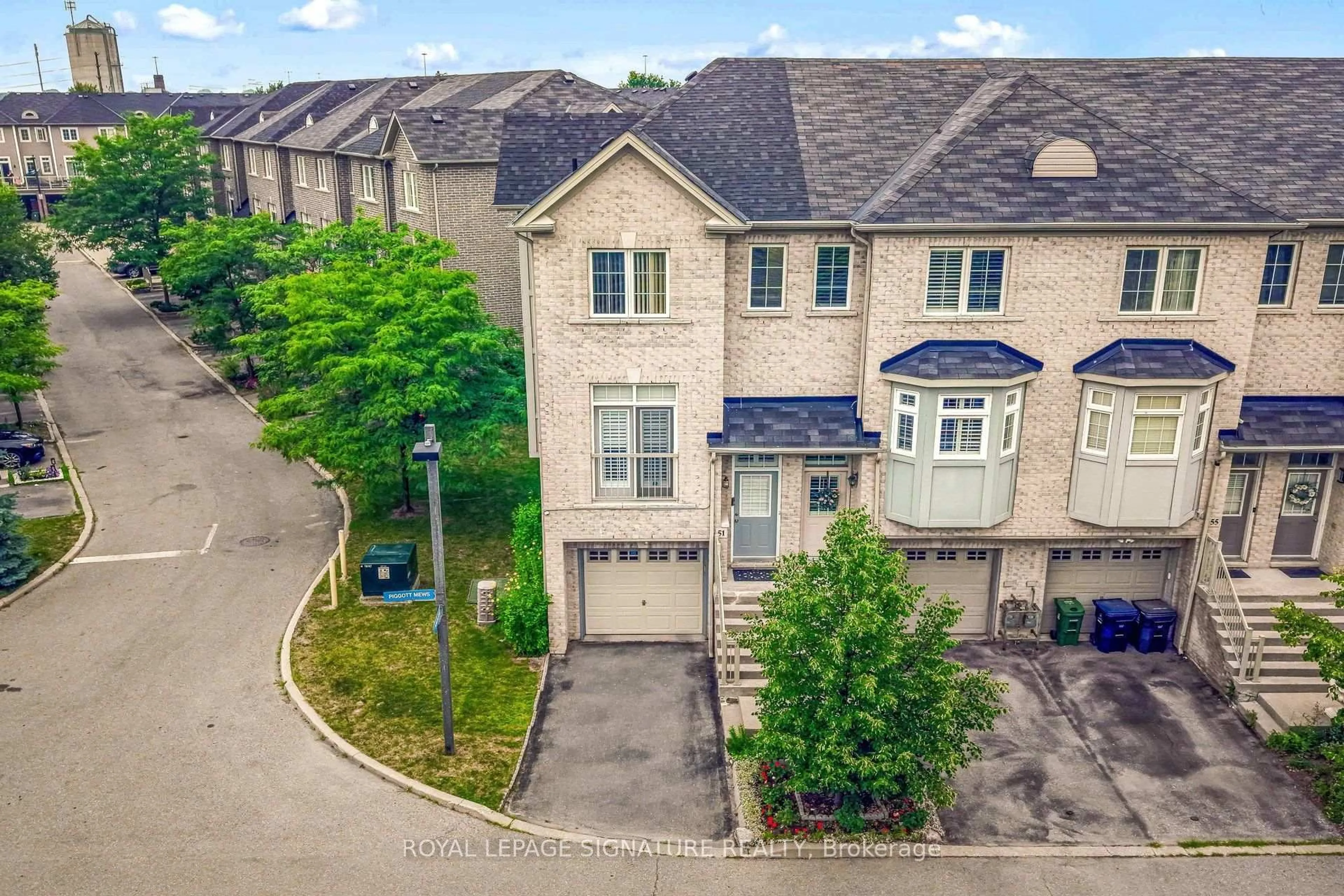 A pic from outside/outdoor area/front of a property/back of a property/a pic from drone, street for 51 Piggott Mews, Toronto Ontario M9N 0A4