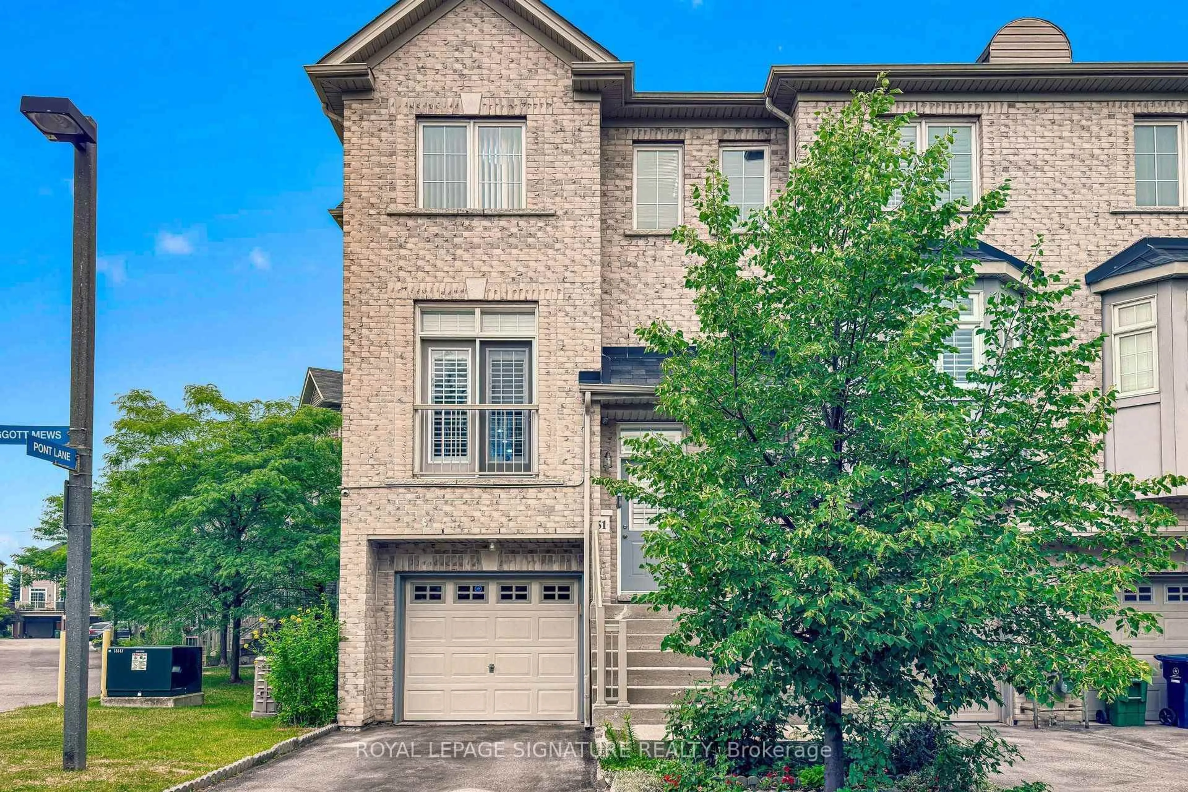 Home with brick exterior material, street for 51 Piggott Mews, Toronto Ontario M9N 0A4