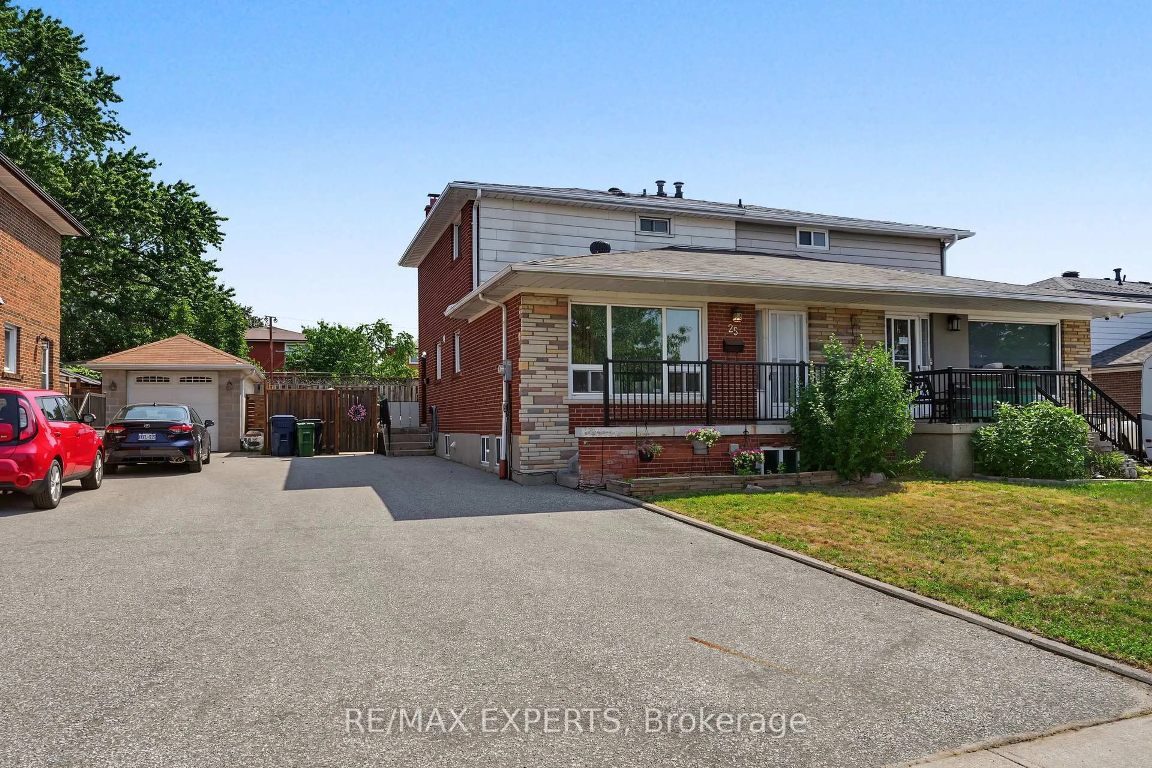 Home with brick exterior material, street for 25 Riverton Dr, Toronto Ontario M9L 2N8