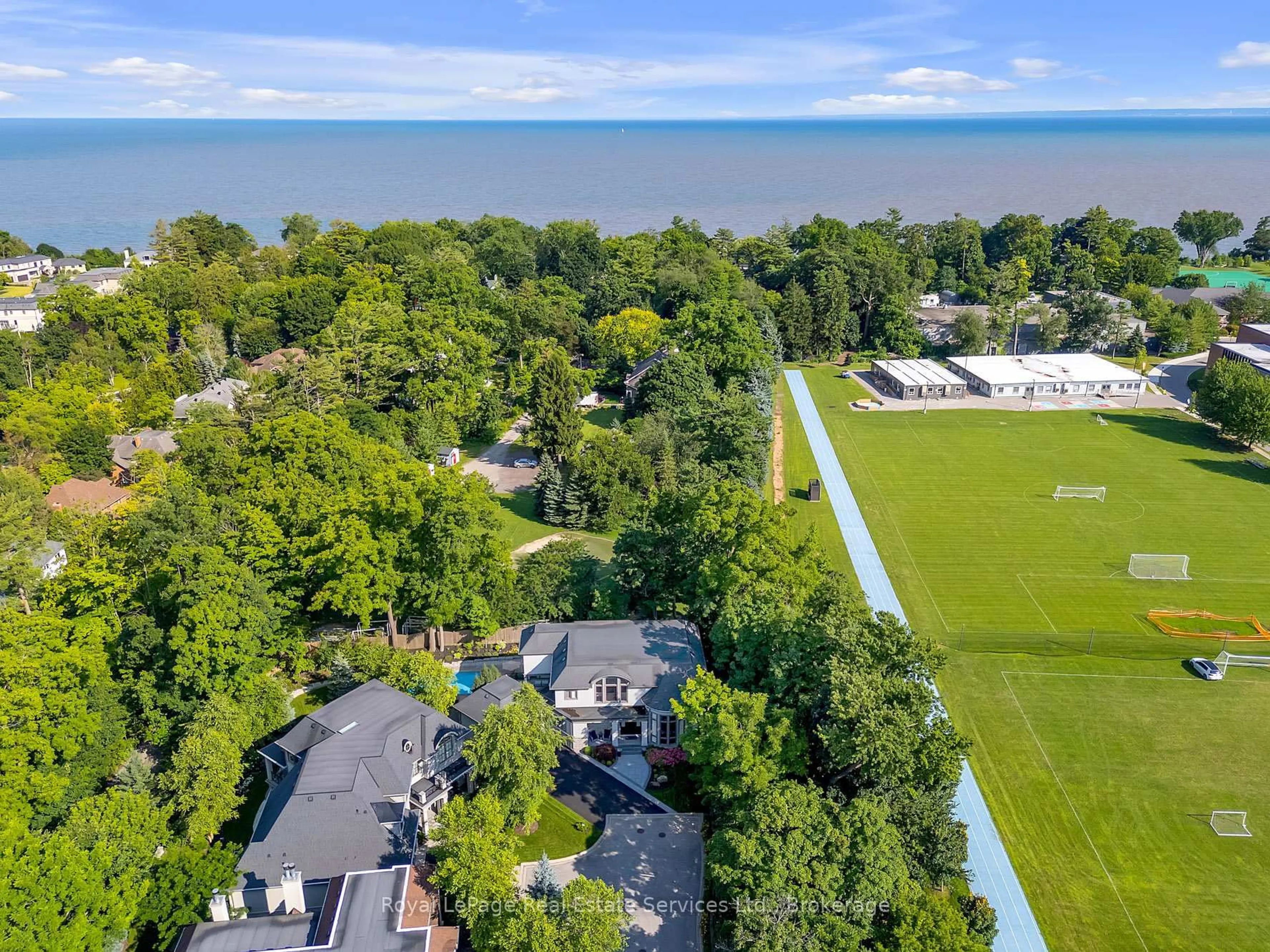 A pic from outside/outdoor area/front of a property/back of a property/a pic from drone, water/lake/river/ocean view for 456 Lakeshore Rd, Oakville Ontario L6K 1G5
