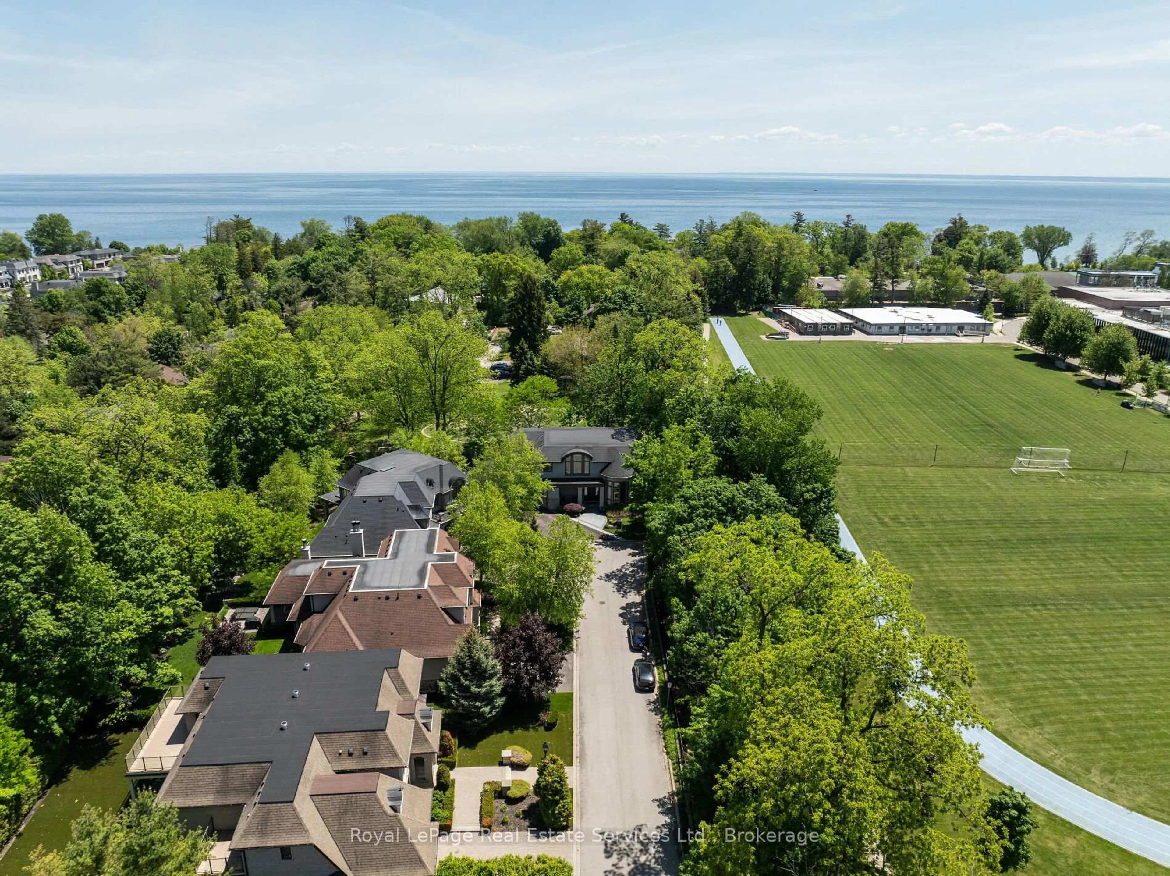 A pic from outside/outdoor area/front of a property/back of a property/a pic from drone, water/lake/river/ocean view for 456 Lakeshore Rd, Oakville Ontario L6K 1G5