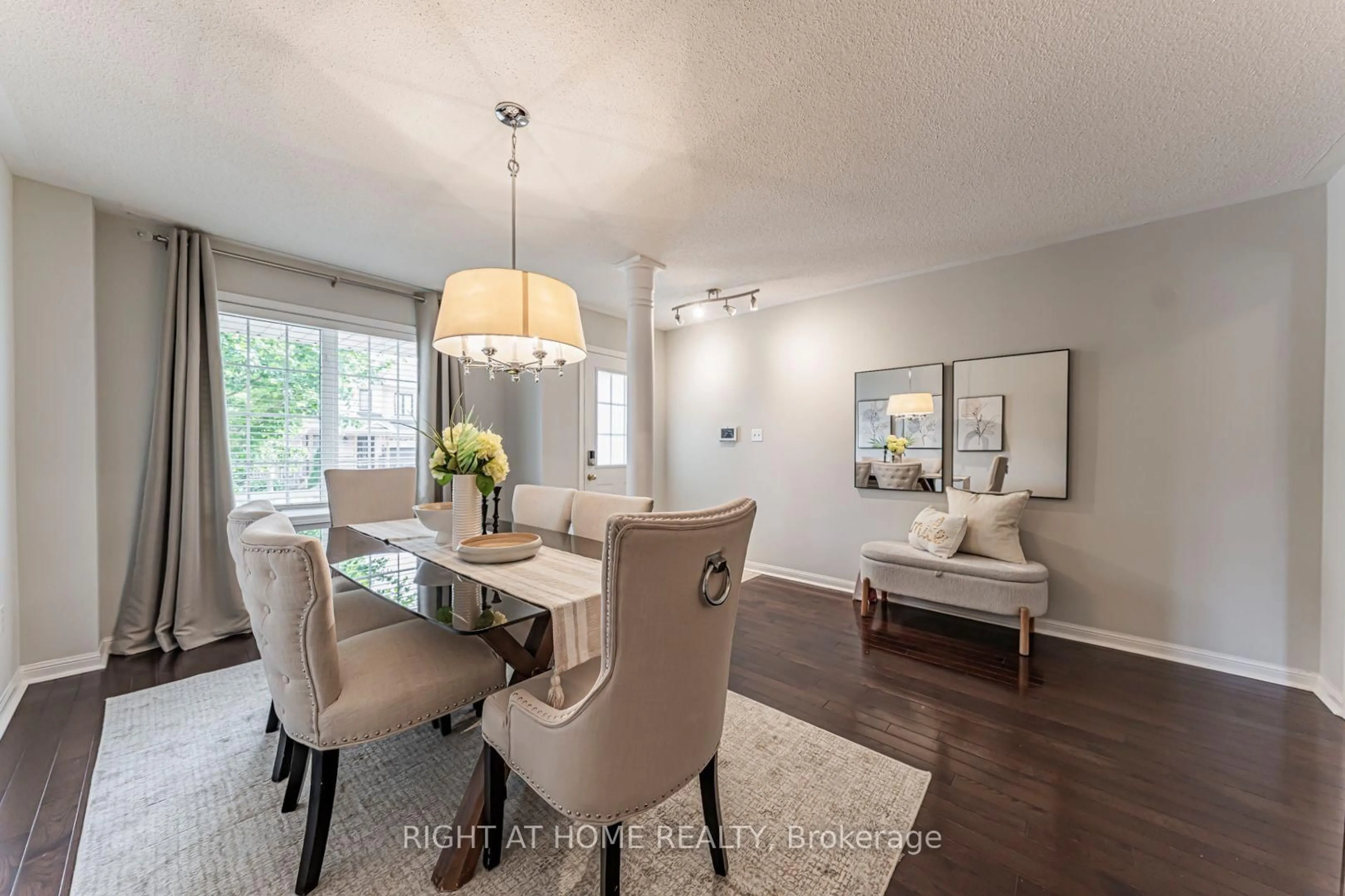 Dining room, wood/laminate floor for 11 Olivett Lane, Brampton Ontario L7A 2X3