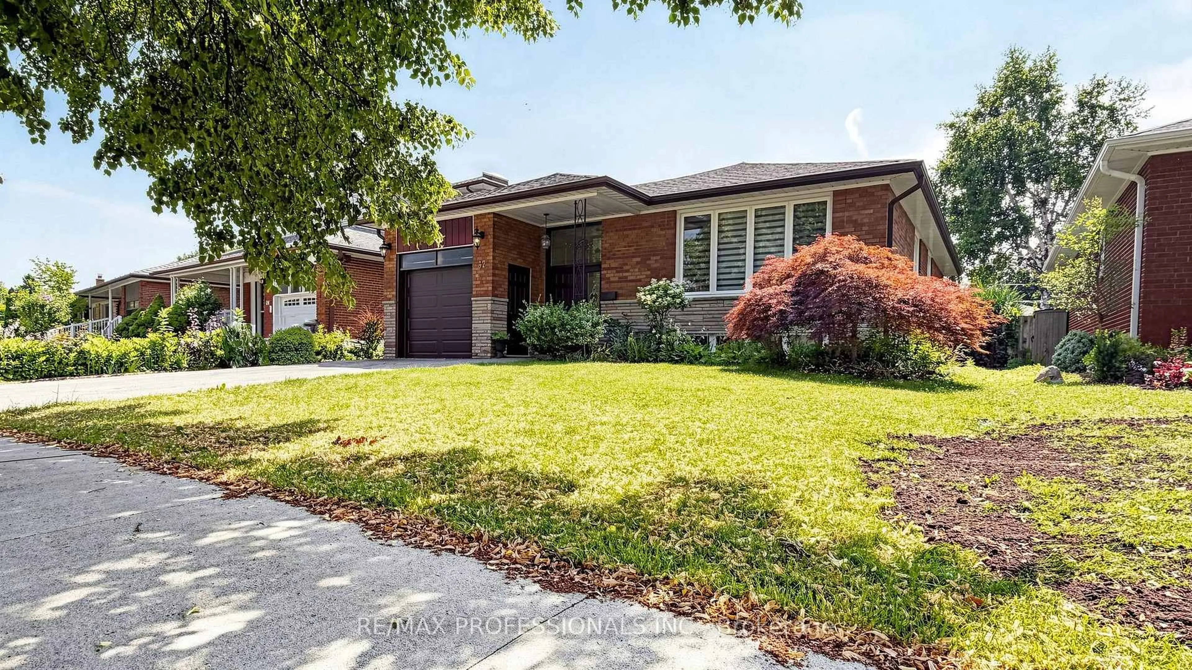 Home with brick exterior material, street for 32 Sellmar Rd, Toronto Ontario M9P 3E6