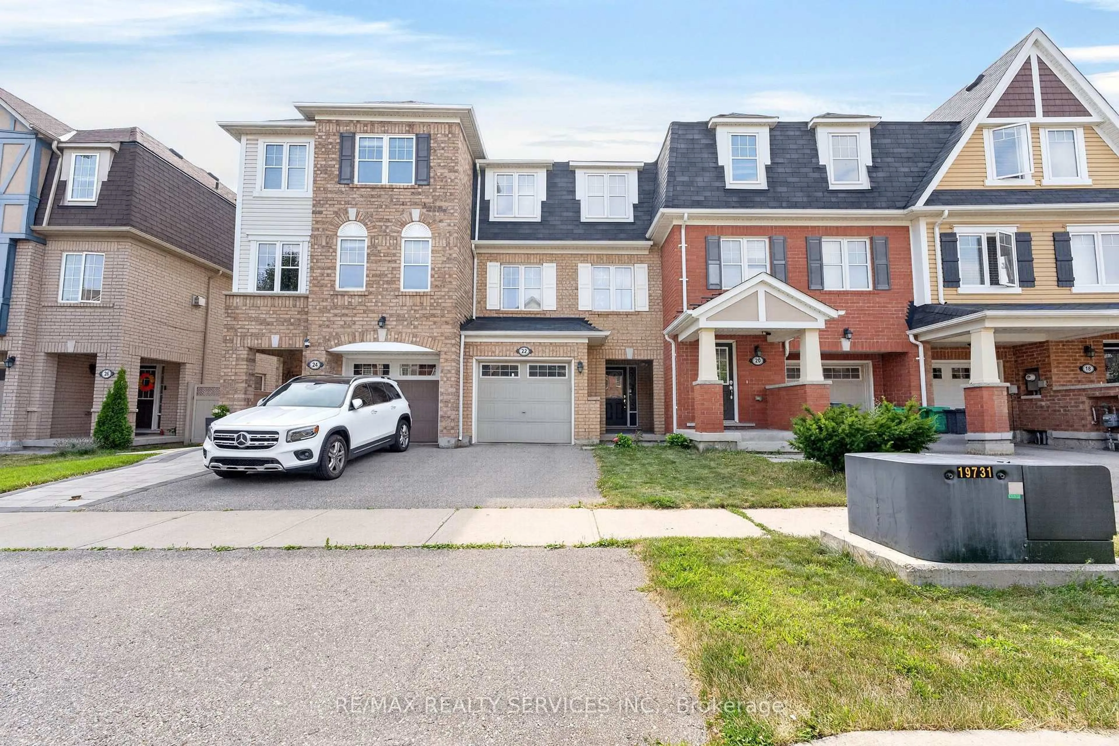 Home with brick exterior material, street for 22 Affleck Rd, Brampton Ontario L7A 3Y8