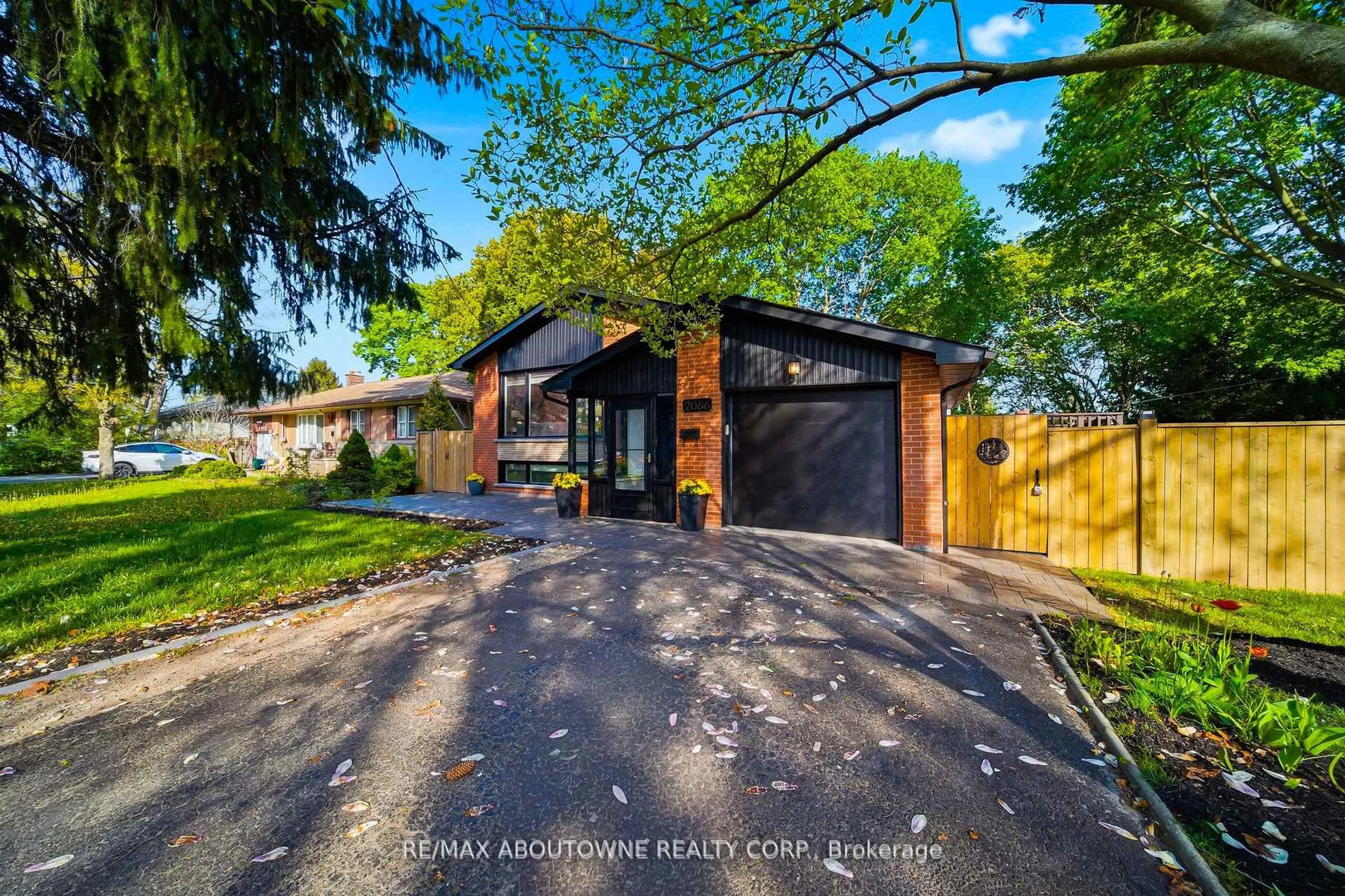 Home with brick exterior material, street for 2066 Rebecca St, Oakville Ontario L6L 2A2
