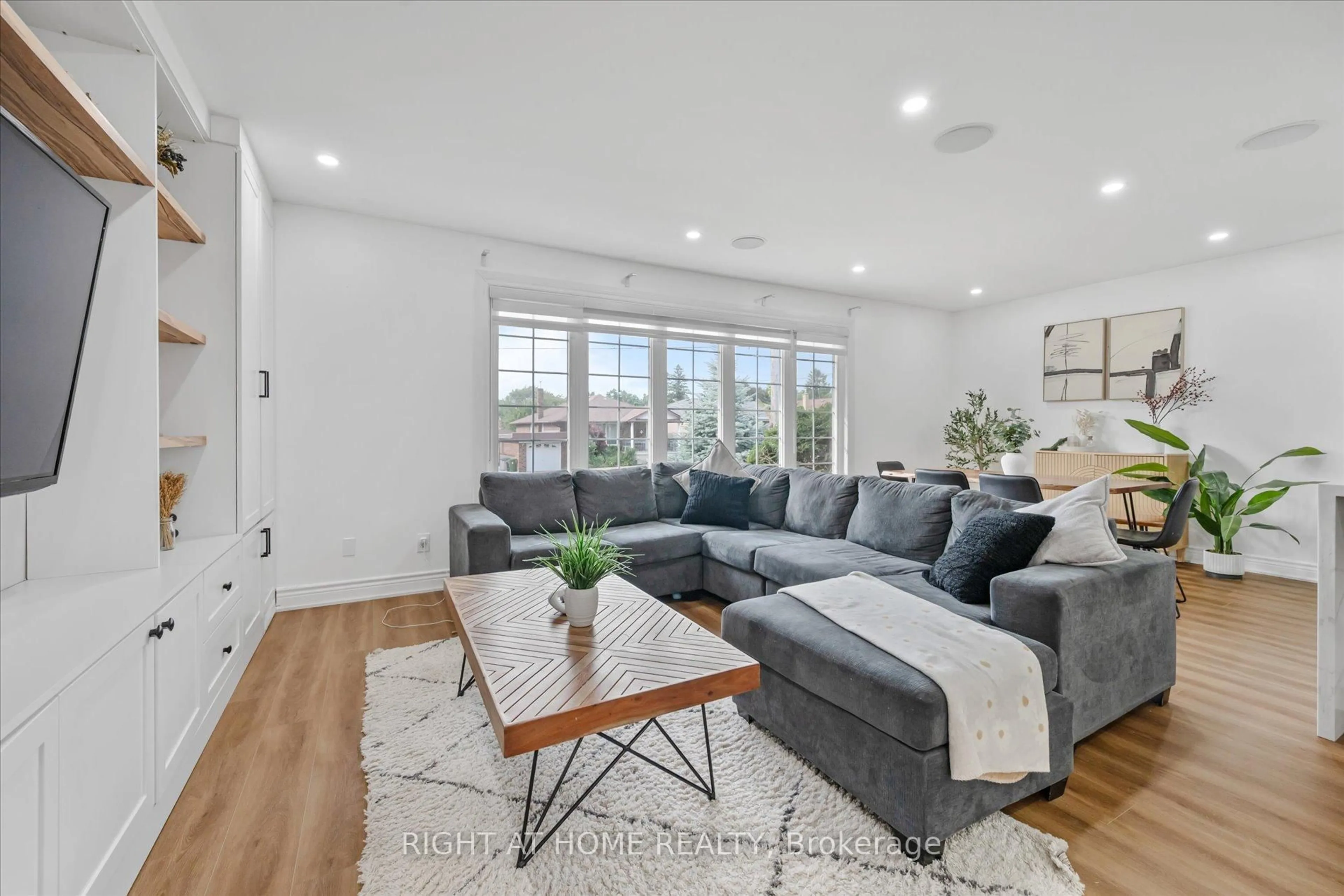 Living room with furniture, unknown for 93 Denbigh Cres, Toronto Ontario M3M 2T4