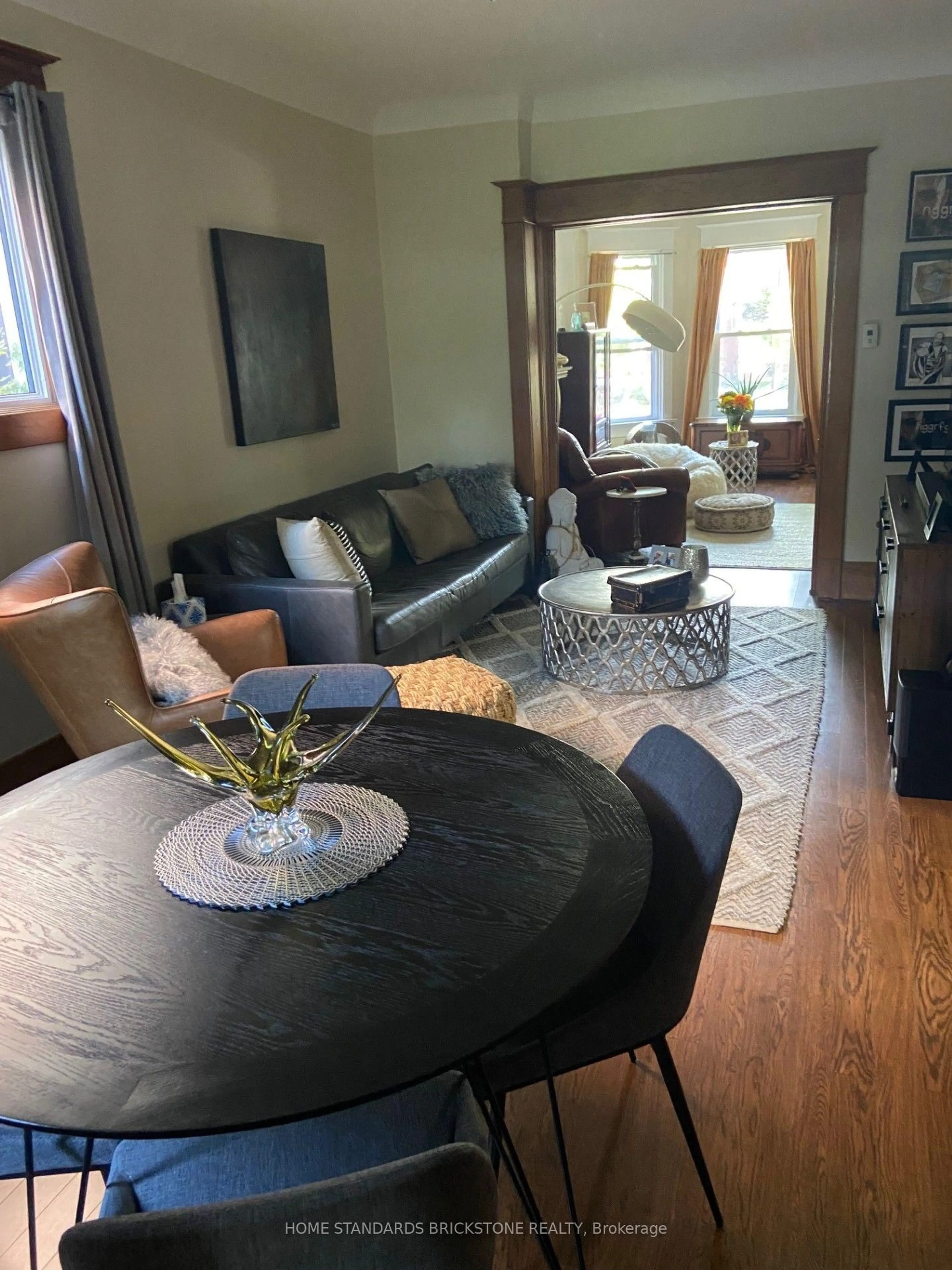 Living room with furniture, wood/laminate floor for 136 Medland St, Toronto Ontario M6P 2N5