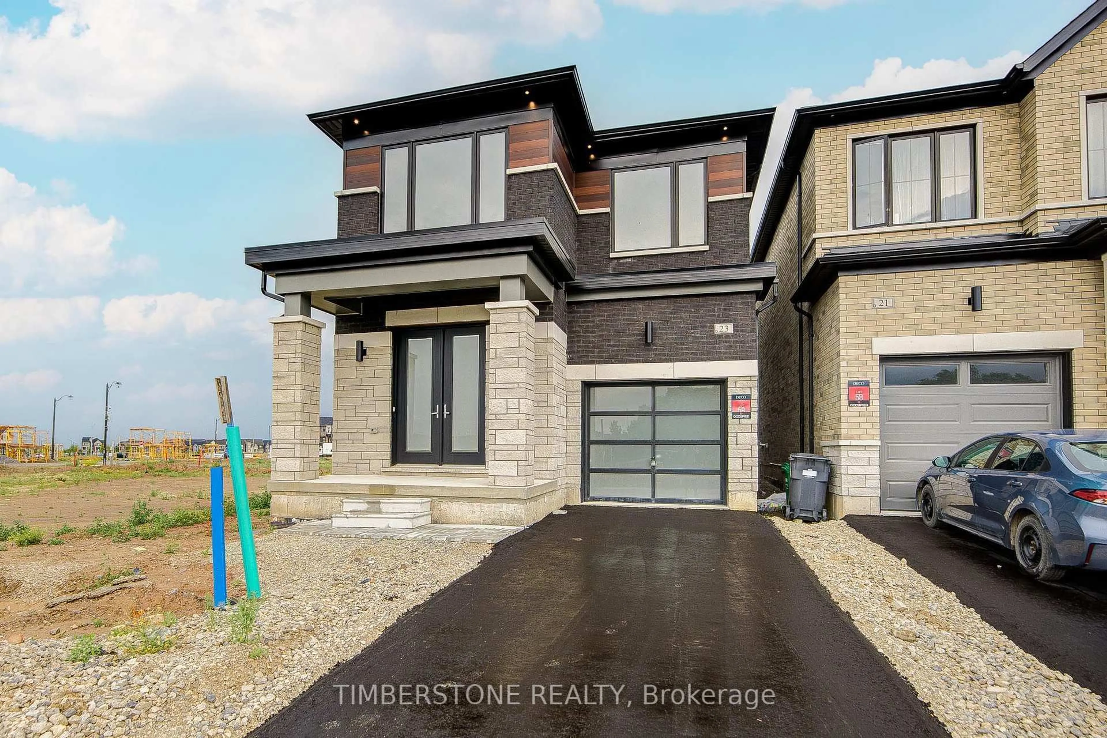 Home with brick exterior material, street for 23 Fieldfare Rd, Brampton Ontario L7A 5M1
