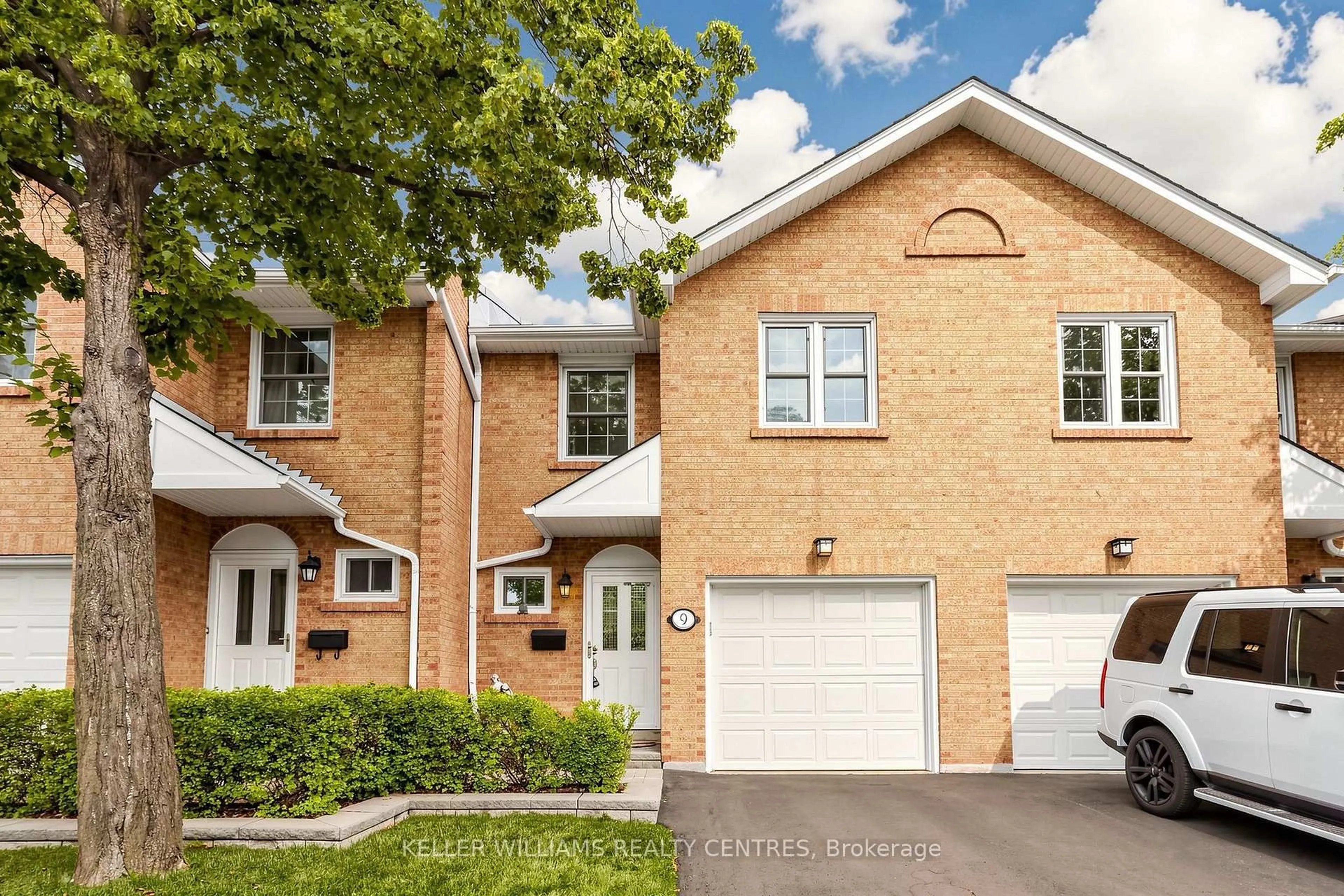 Home with brick exterior material, street for 1951 Rathburn Rd #9, Mississauga Ontario L4W 2N9