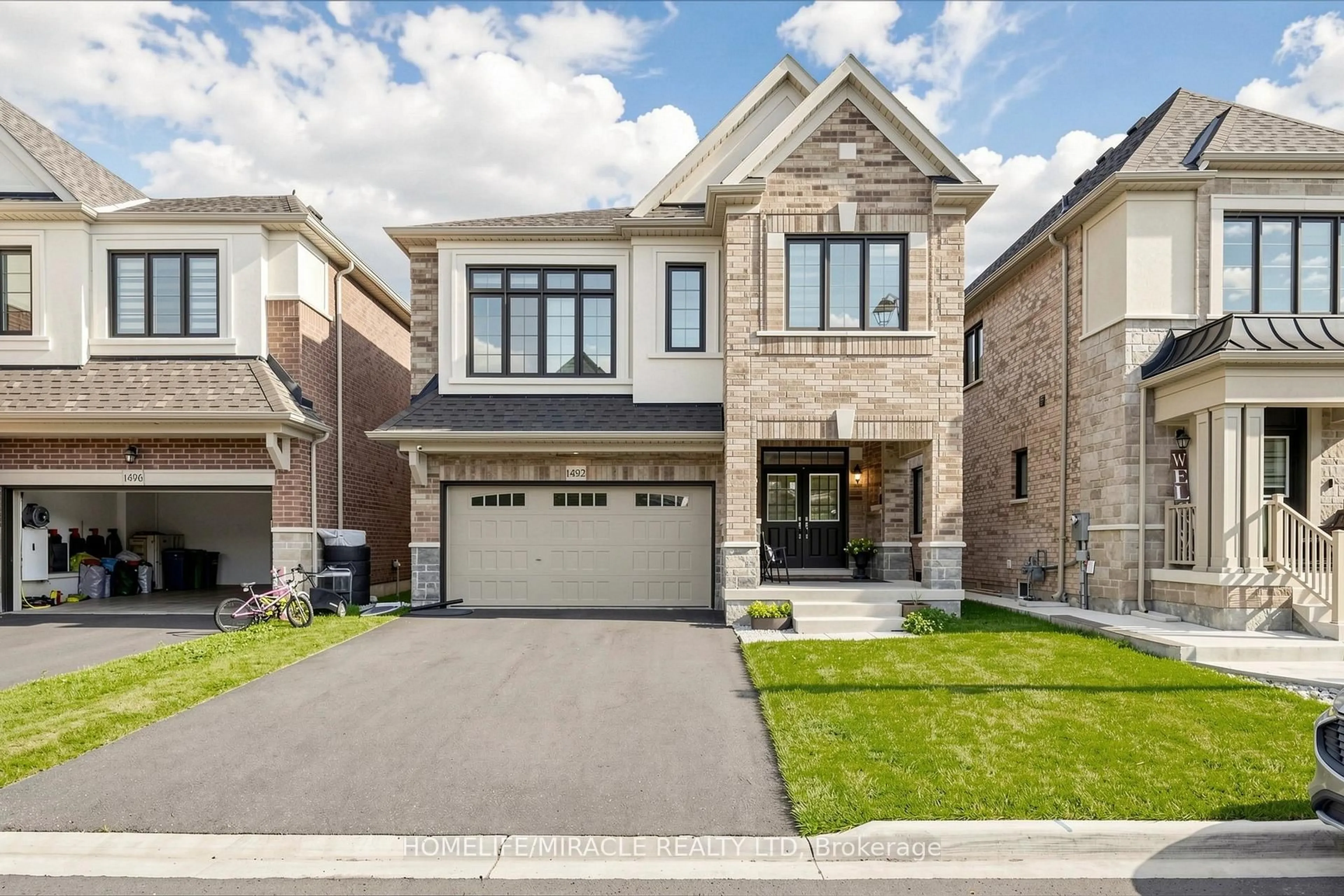 Home with brick exterior material, street for 1492 Kitchen Crt, Milton Ontario L9E 1Y8