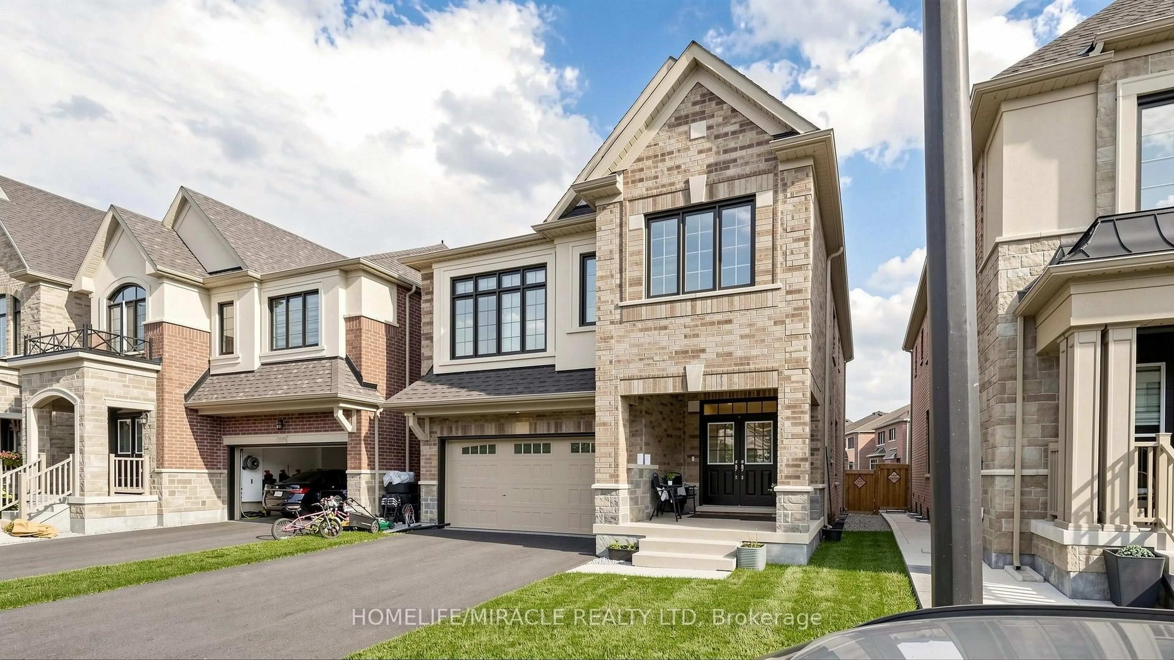 Home with brick exterior material, street for 1492 Kitchen Crt, Milton Ontario L9E 1Y8