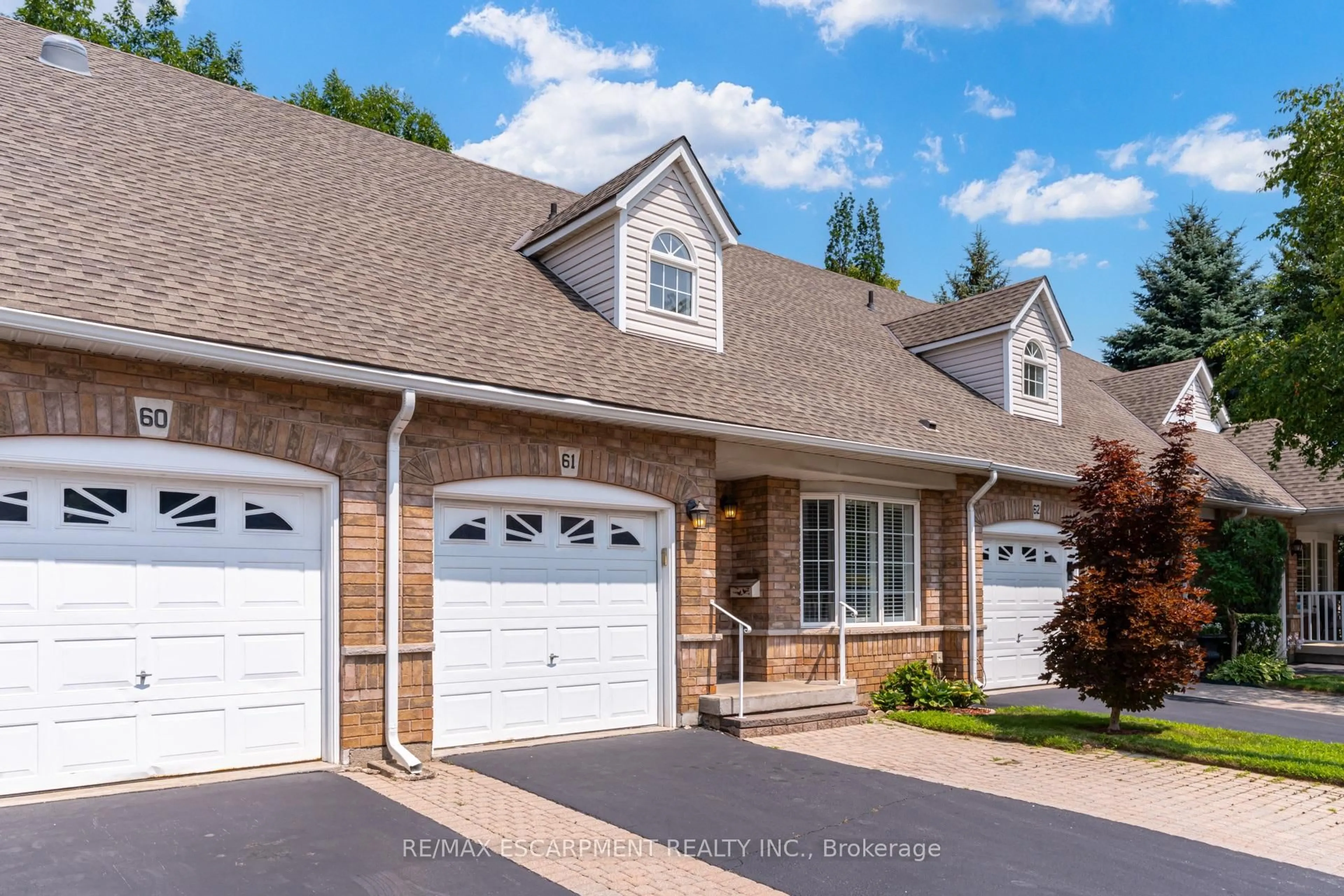 Home with brick exterior material, street for 3045 New St #61, Burlington Ontario L7N 3V9