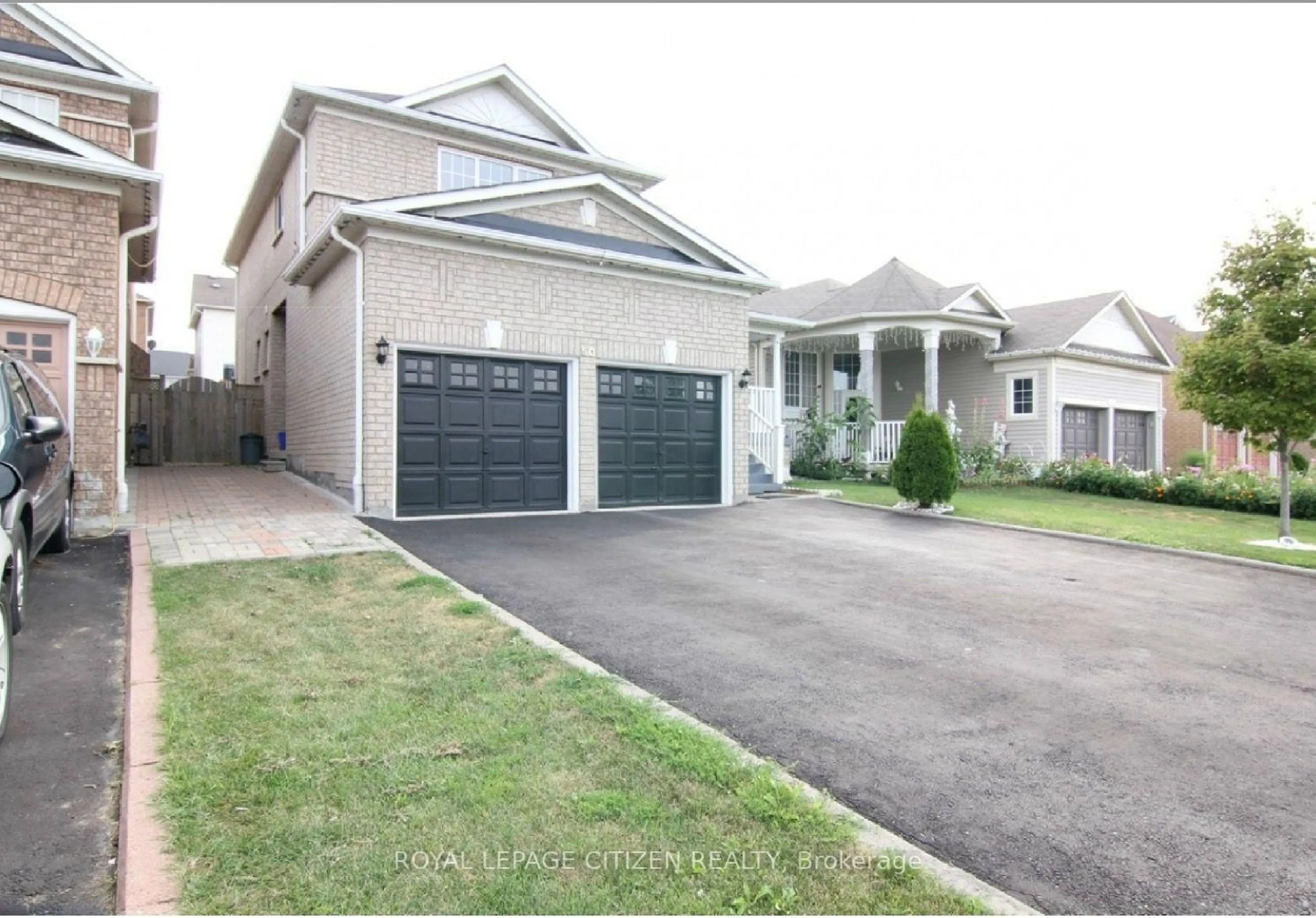 Home with vinyl exterior material, street for 50 Fletchers Creek Blvd, Brampton Ontario L6X 4S3