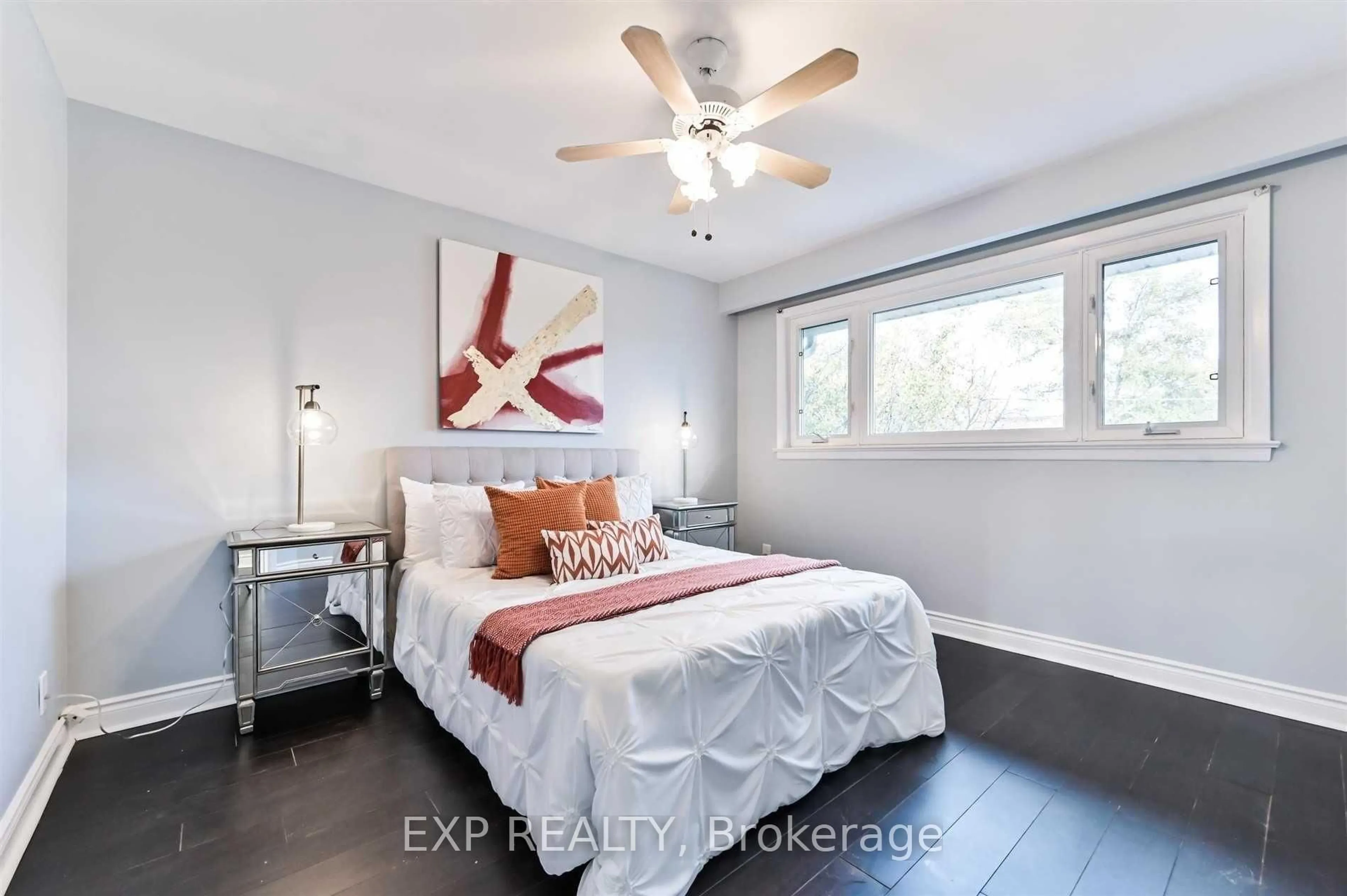 Bedroom with bed, wood/laminate floor for 132 Brookhaven Dr, Toronto Ontario M6M 4P2