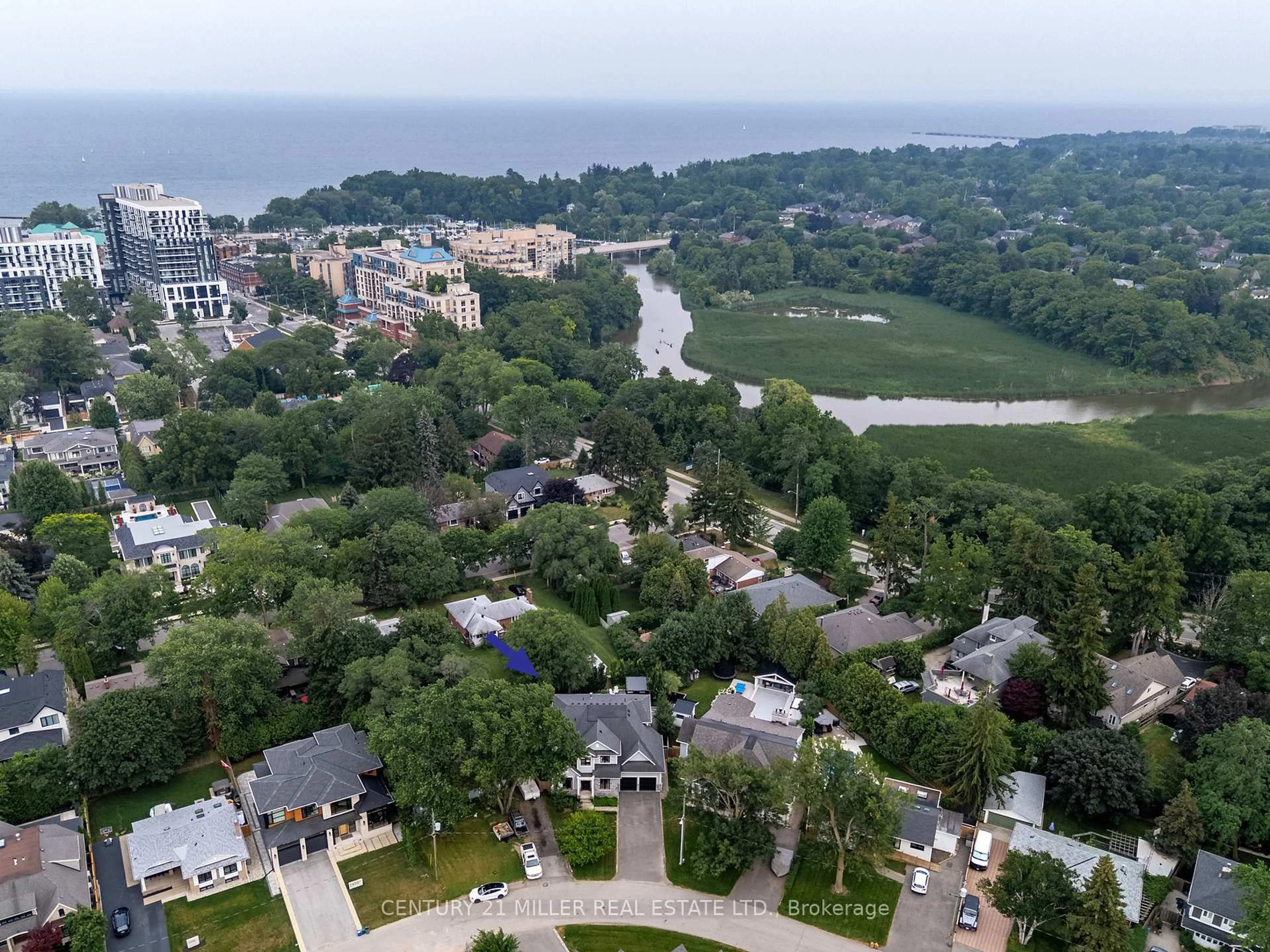 A pic from outside/outdoor area/front of a property/back of a property/a pic from drone, water/lake/river/ocean view for 2458 Meadowood Cres, Oakville Ontario L6L 1V6