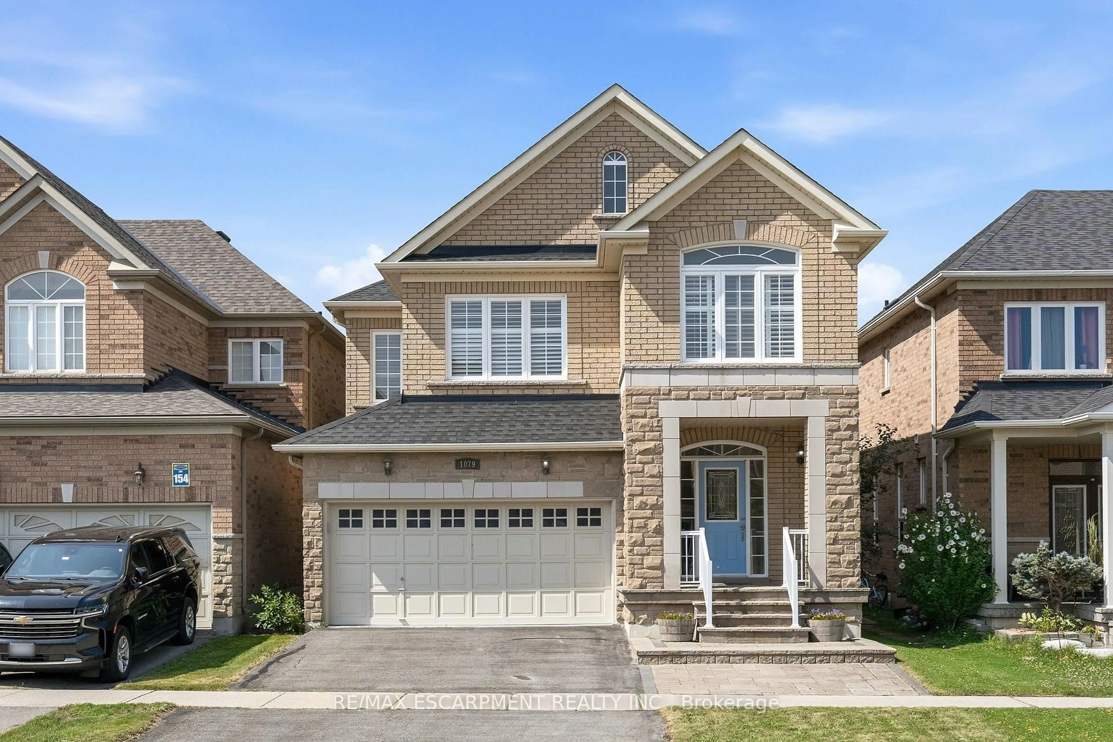 Home with brick exterior material, street for 1079 Tupper Dr, Milton Ontario L9T 0A8