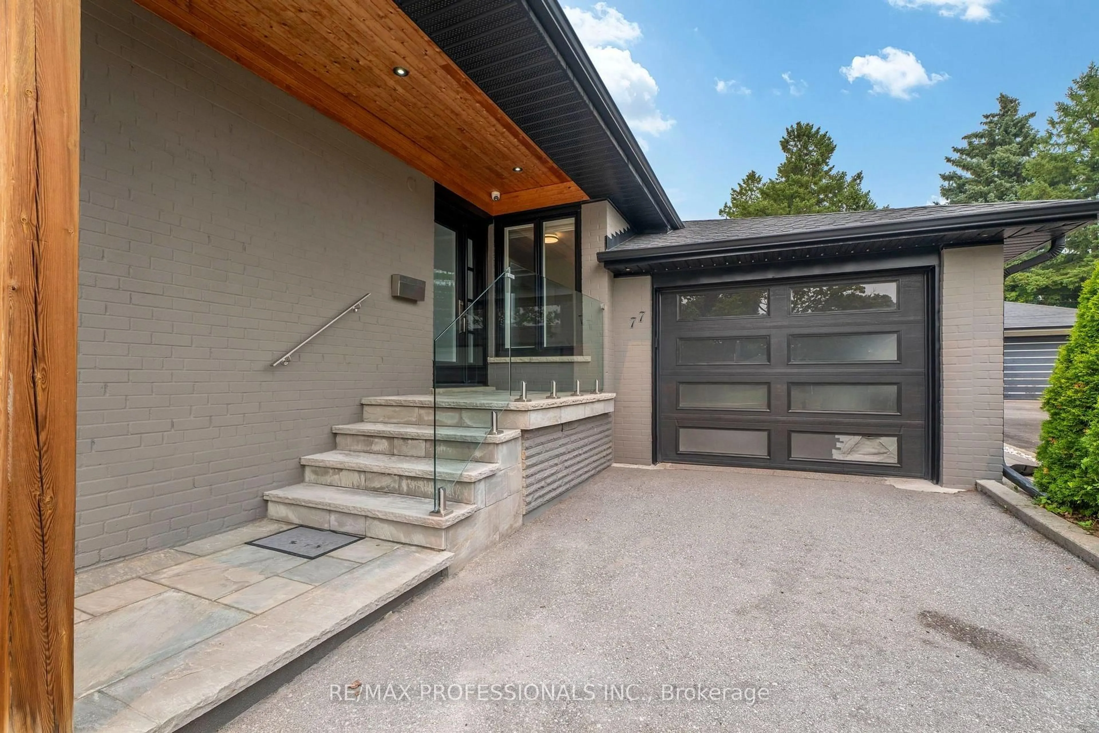 Home with brick exterior material, street for 77 Cronin Dr, Toronto Ontario M9B 4V3