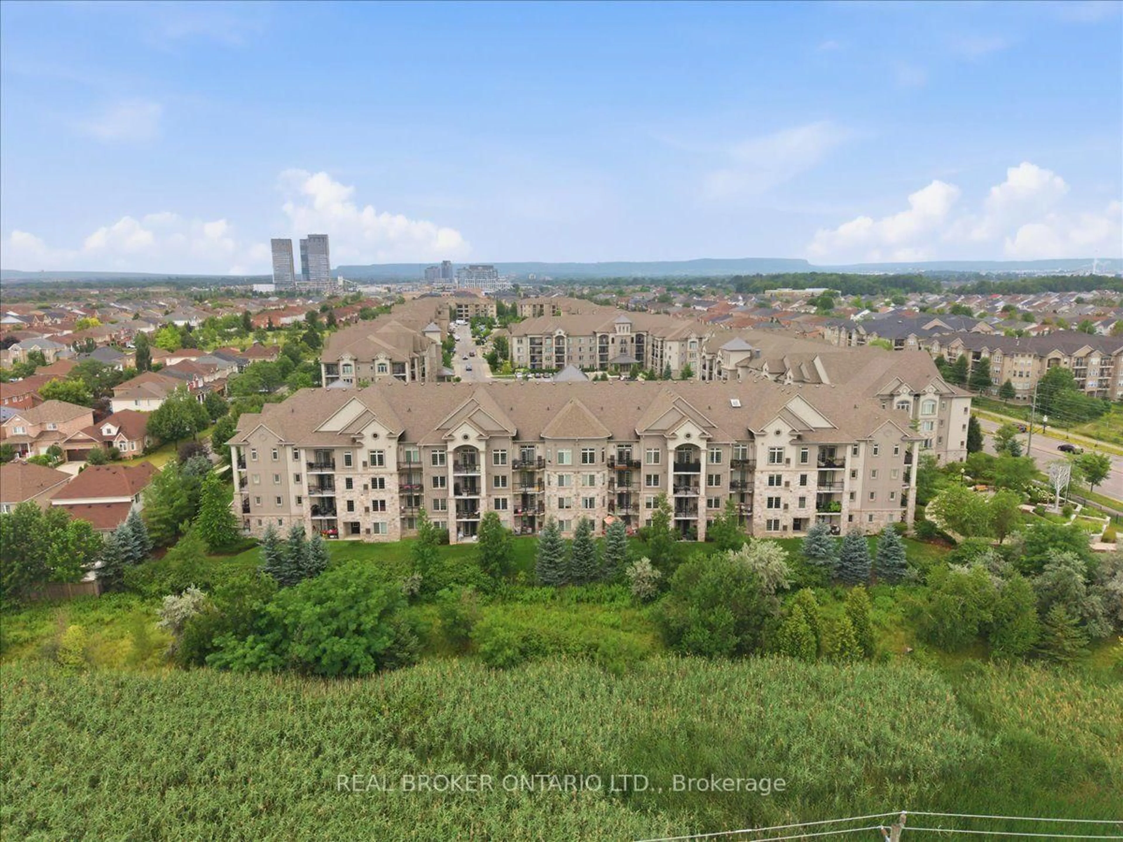 A pic from outside/outdoor area/front of a property/back of a property/a pic from drone, city buildings view from balcony for 1470 Main St #411, Milton Ontario L9T 8W6