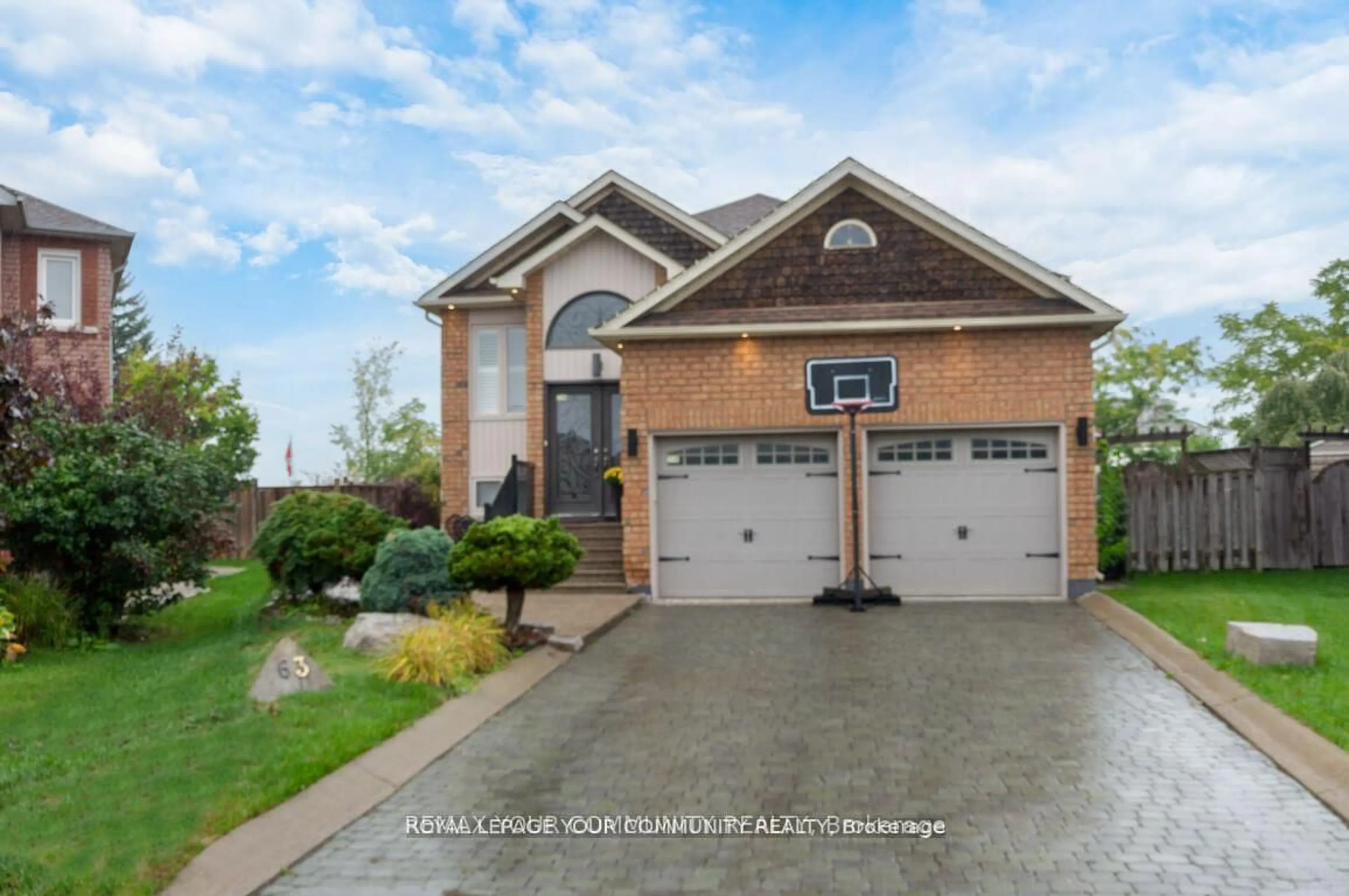 Home with brick exterior material, street for 63 Rolling Hills Lane, Caledon Ontario L7E 1T8