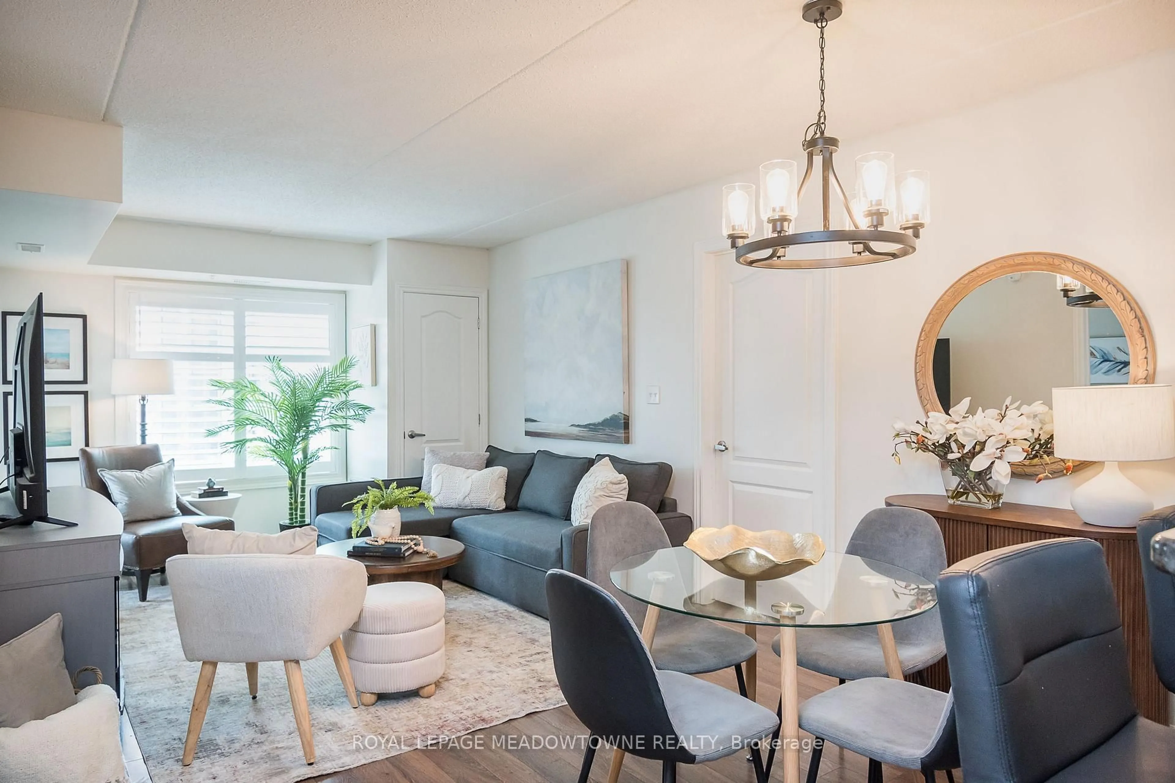 Living room with furniture, unknown for 1440 Main St #303, Milton Ontario L9T 8W3