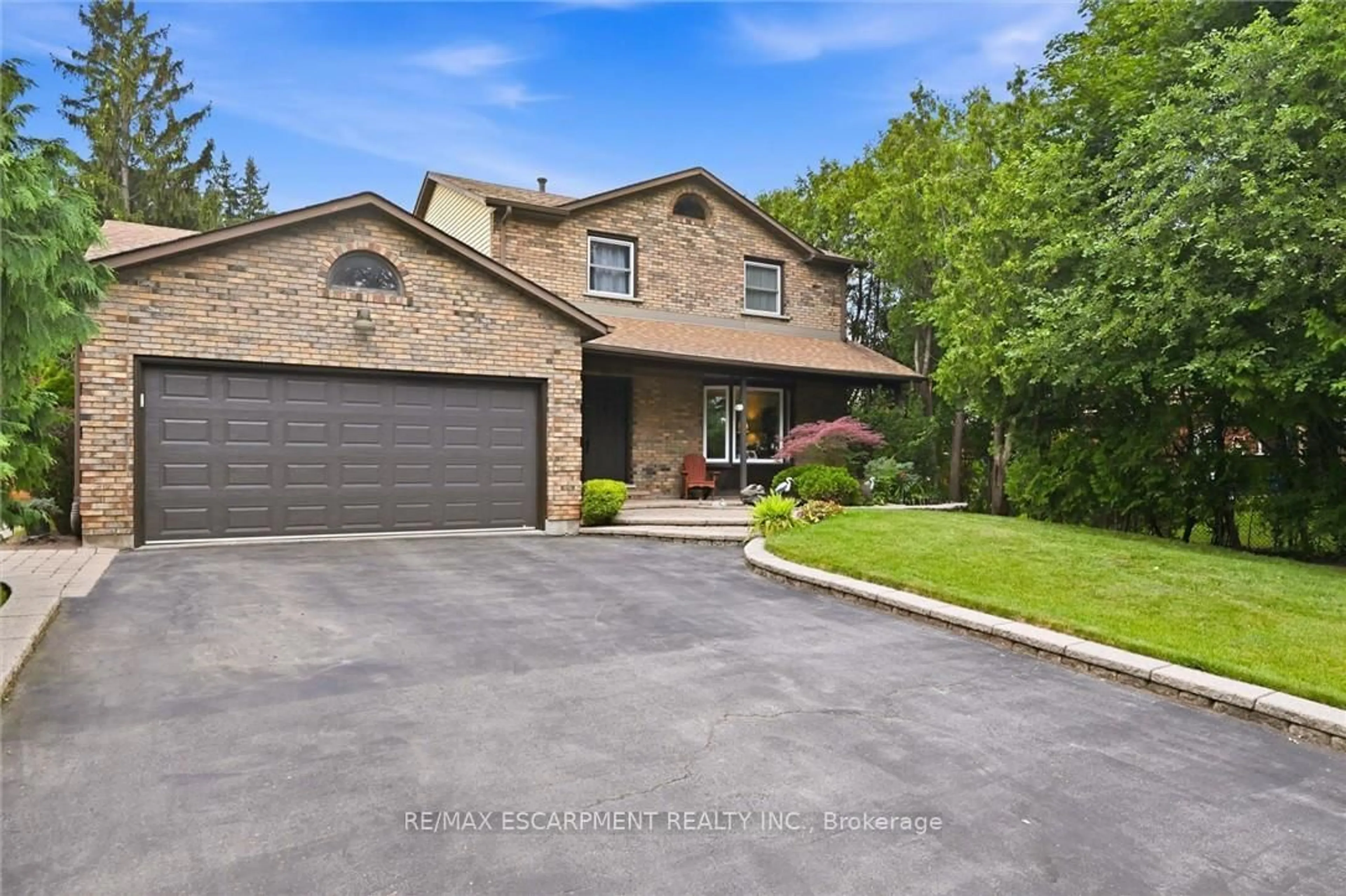 Home with brick exterior material, street for 132 Hampton Heath Rd, Burlington Ontario L7L 4N9