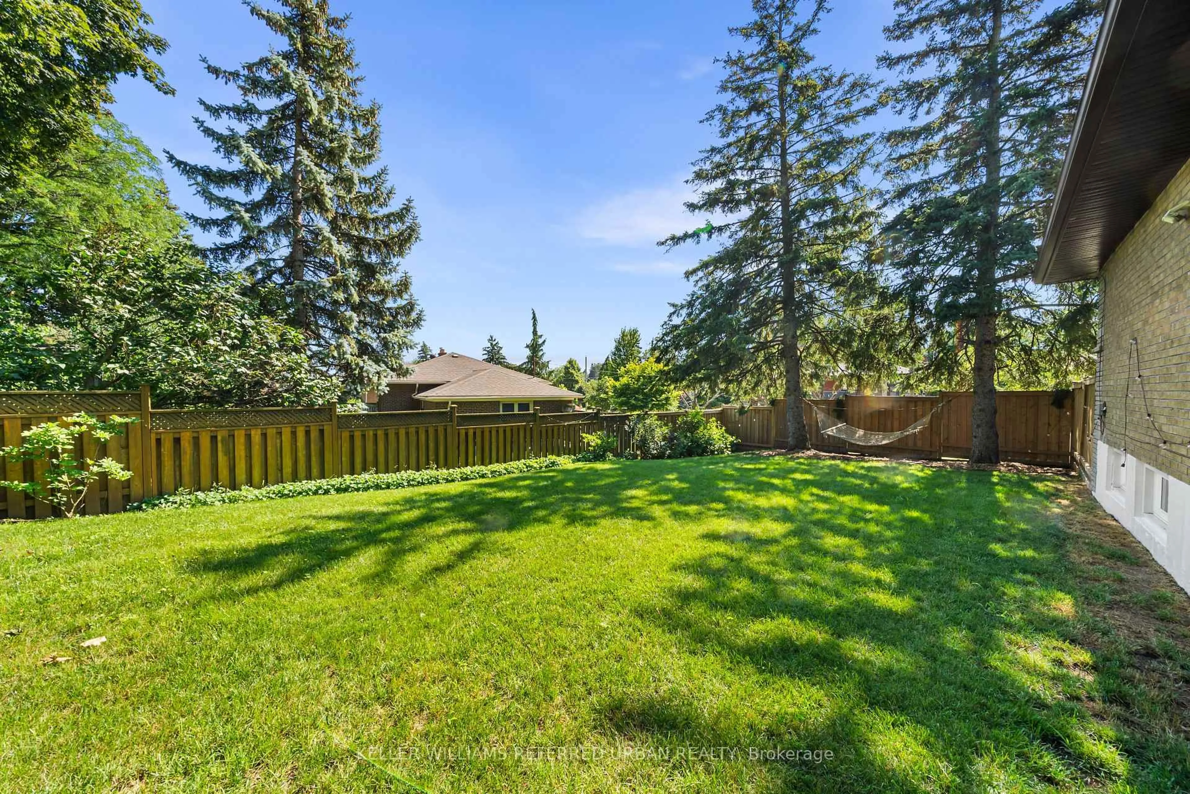 Patio, forest/trees view for 115 Bonnyview Dr, Toronto Ontario M8Y 3G9
