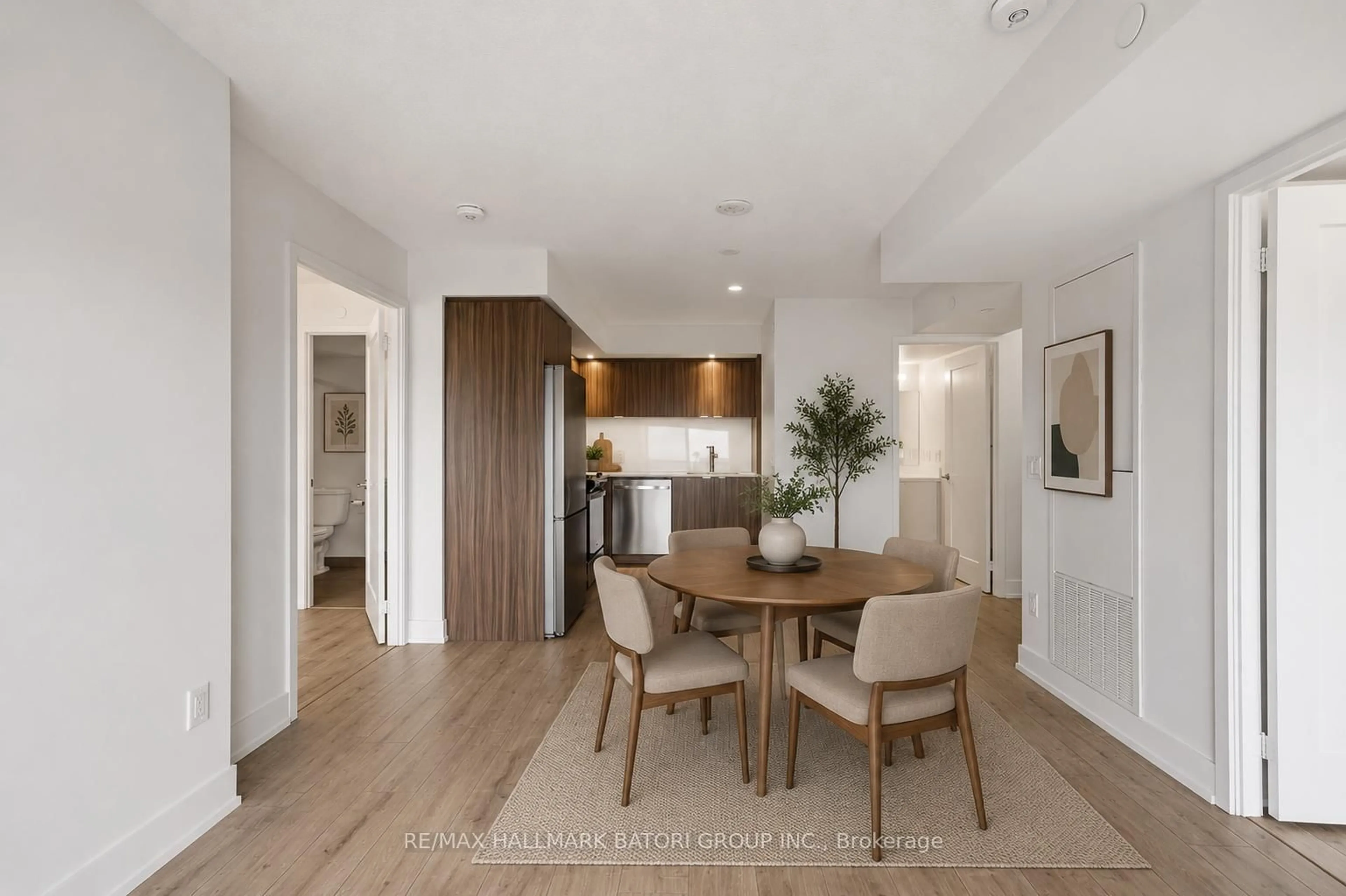 Open concept kitchen, wood/laminate floor for 10 Eva Rd #1505, Toronto Ontario M9C 1E8