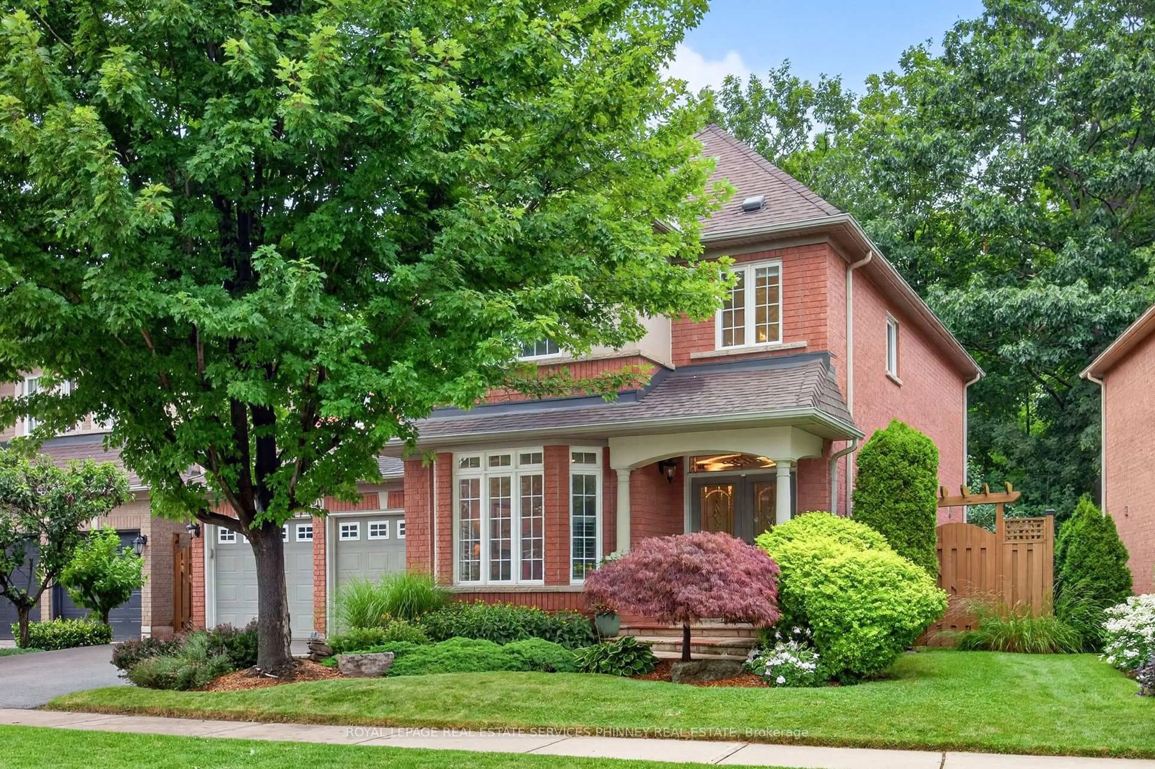Home with brick exterior material, street for 211 Creek Path Ave, Oakville Ontario L6L 6T5