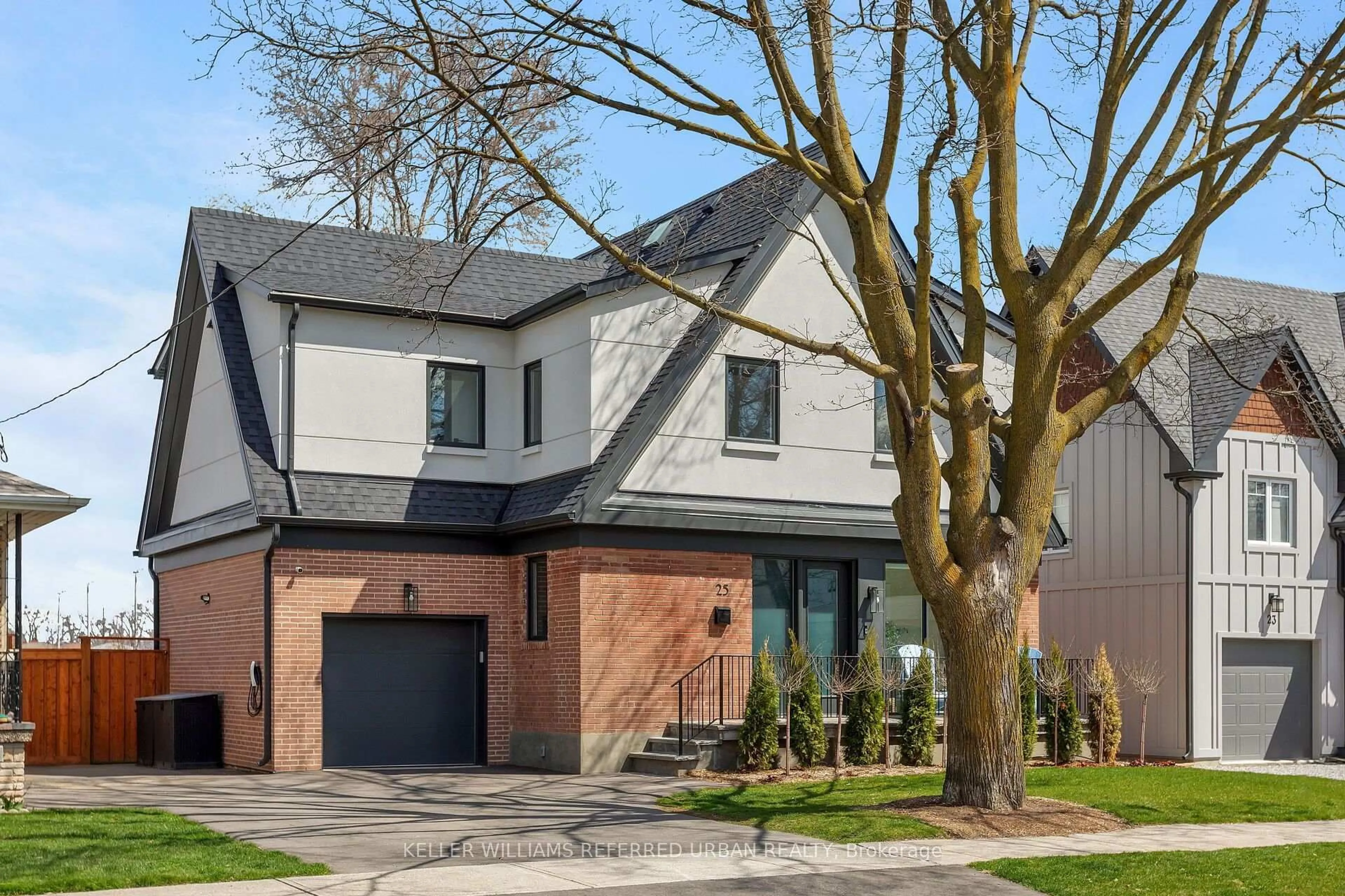 Home with brick exterior material, street for 25 Delma Dr, Toronto Ontario M8W 4N3
