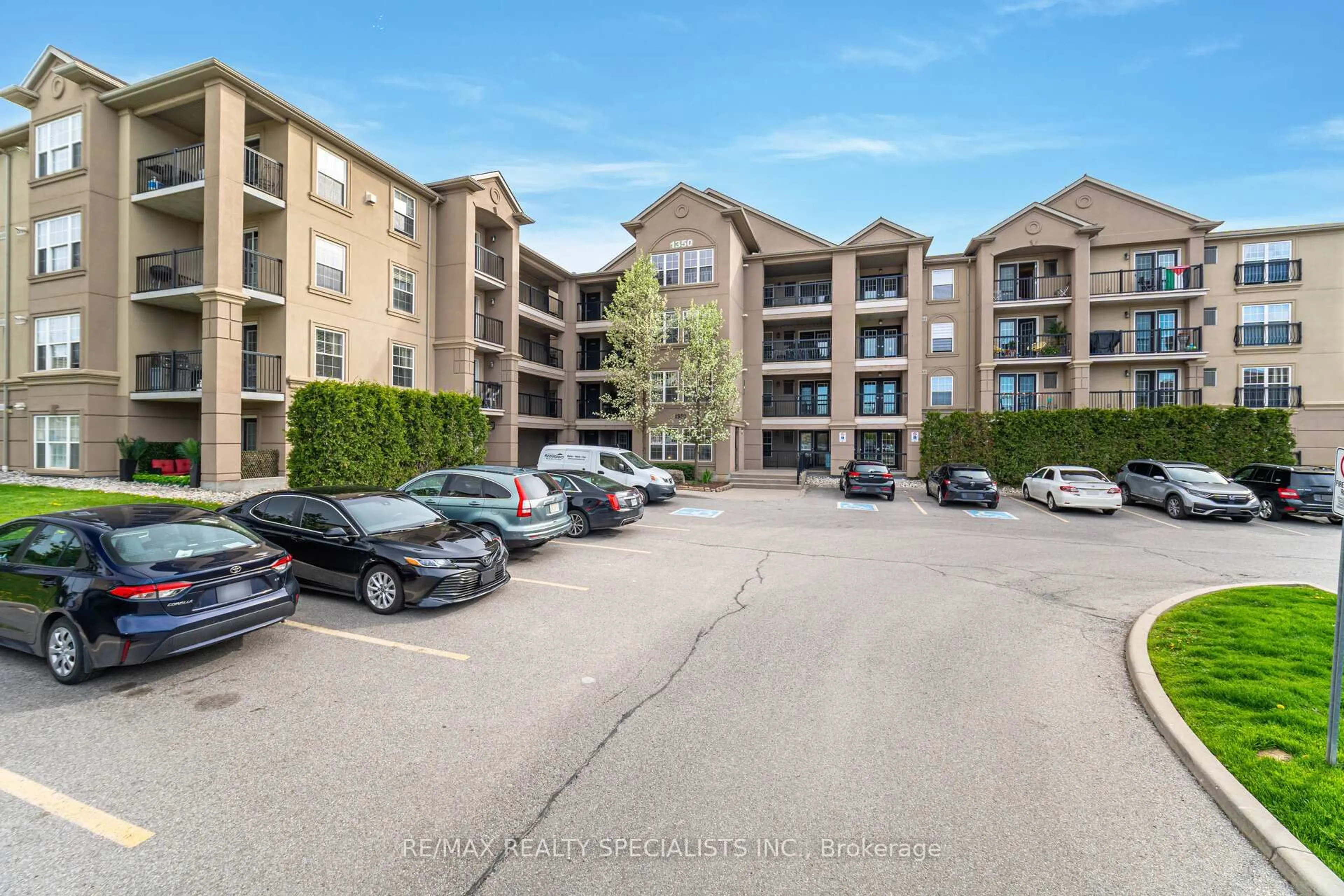 A pic from outside/outdoor area/front of a property/back of a property/a pic from drone, unknown for 1350 Main St #412, Milton Ontario L9T 0R3
