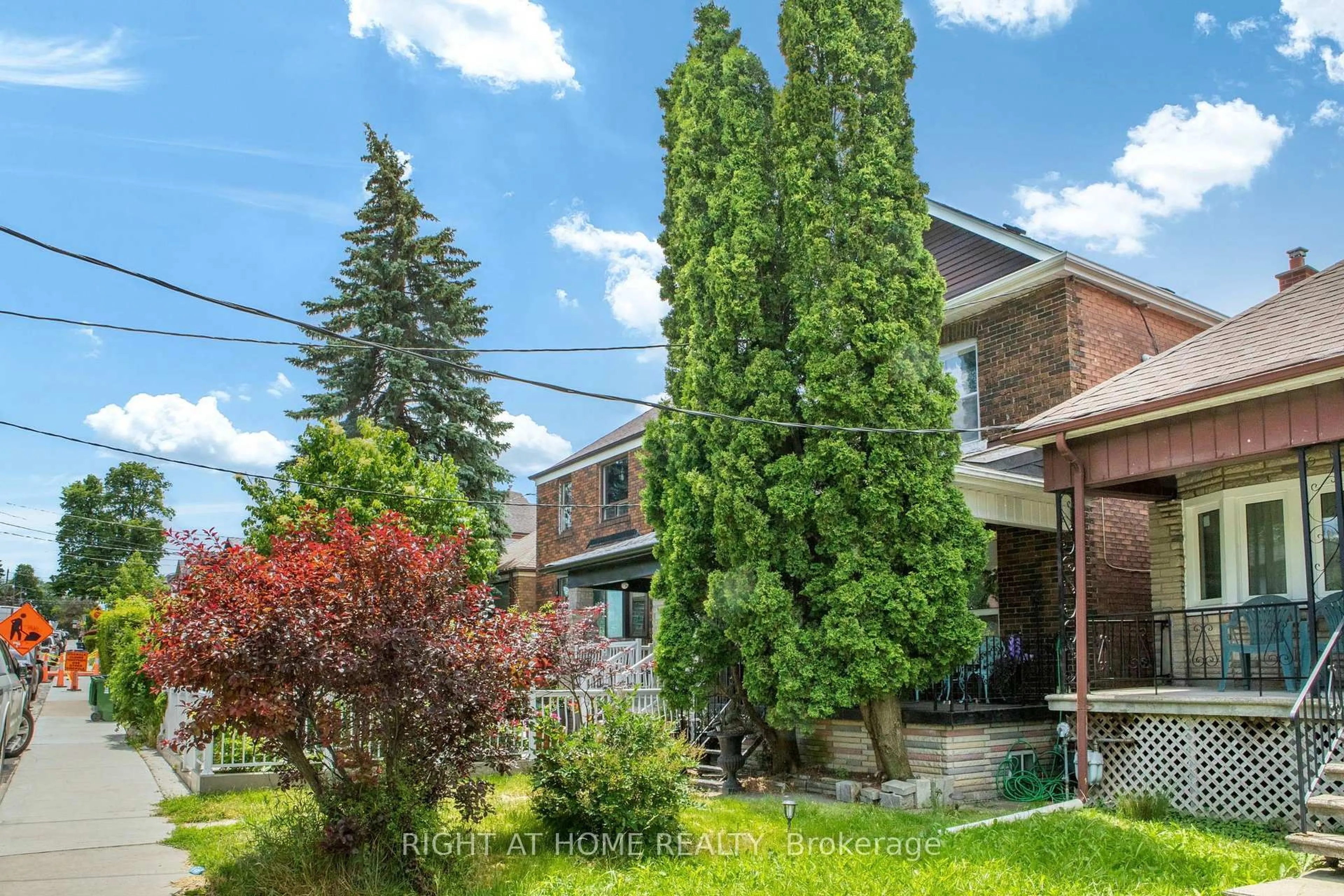 Home with brick exterior material, street for 290 Mcroberts Ave, Toronto Ontario M6E 4P7