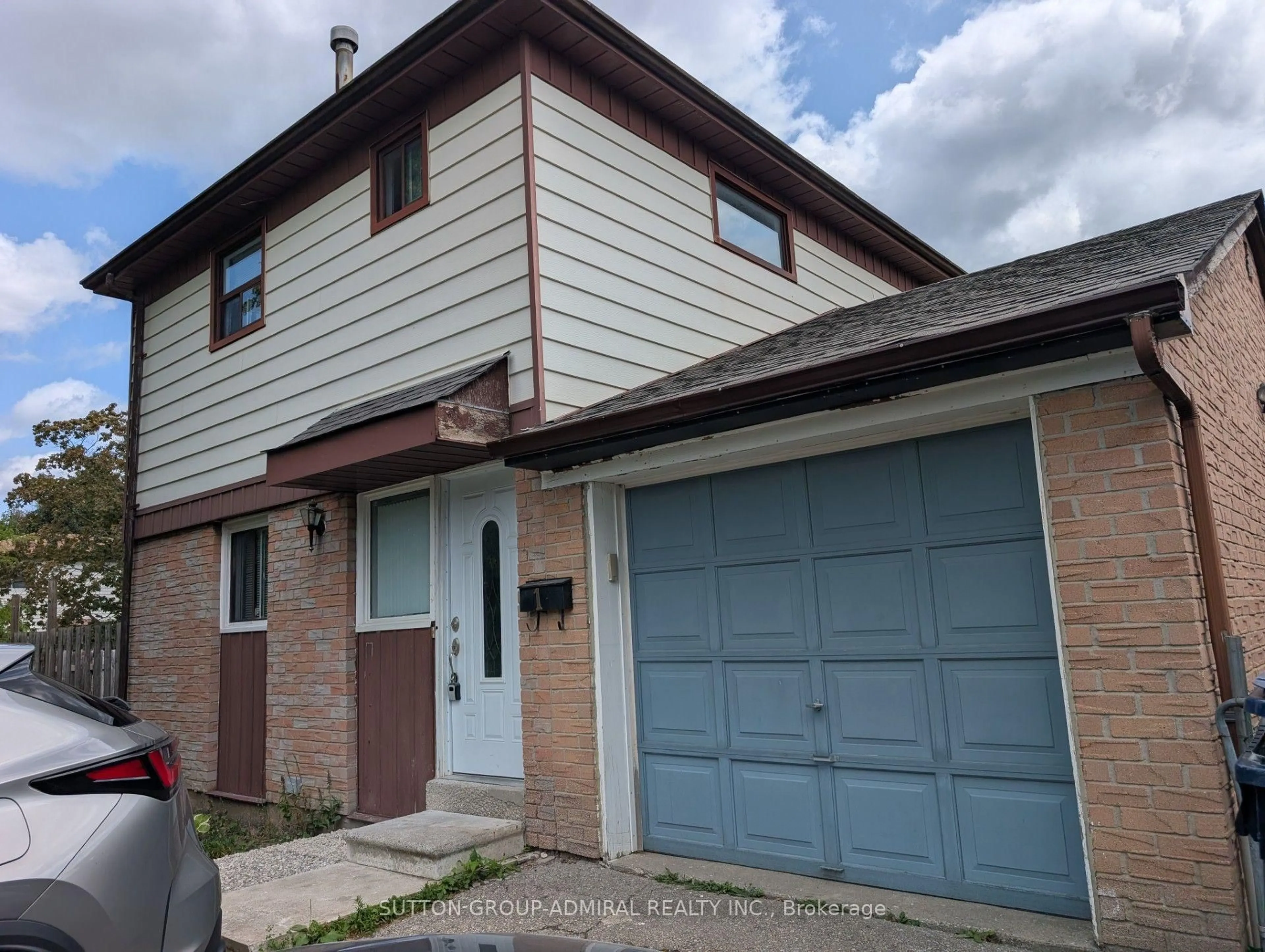 Home with vinyl exterior material, street for 1 Damascus Dr, Toronto Ontario M9V 4E9
