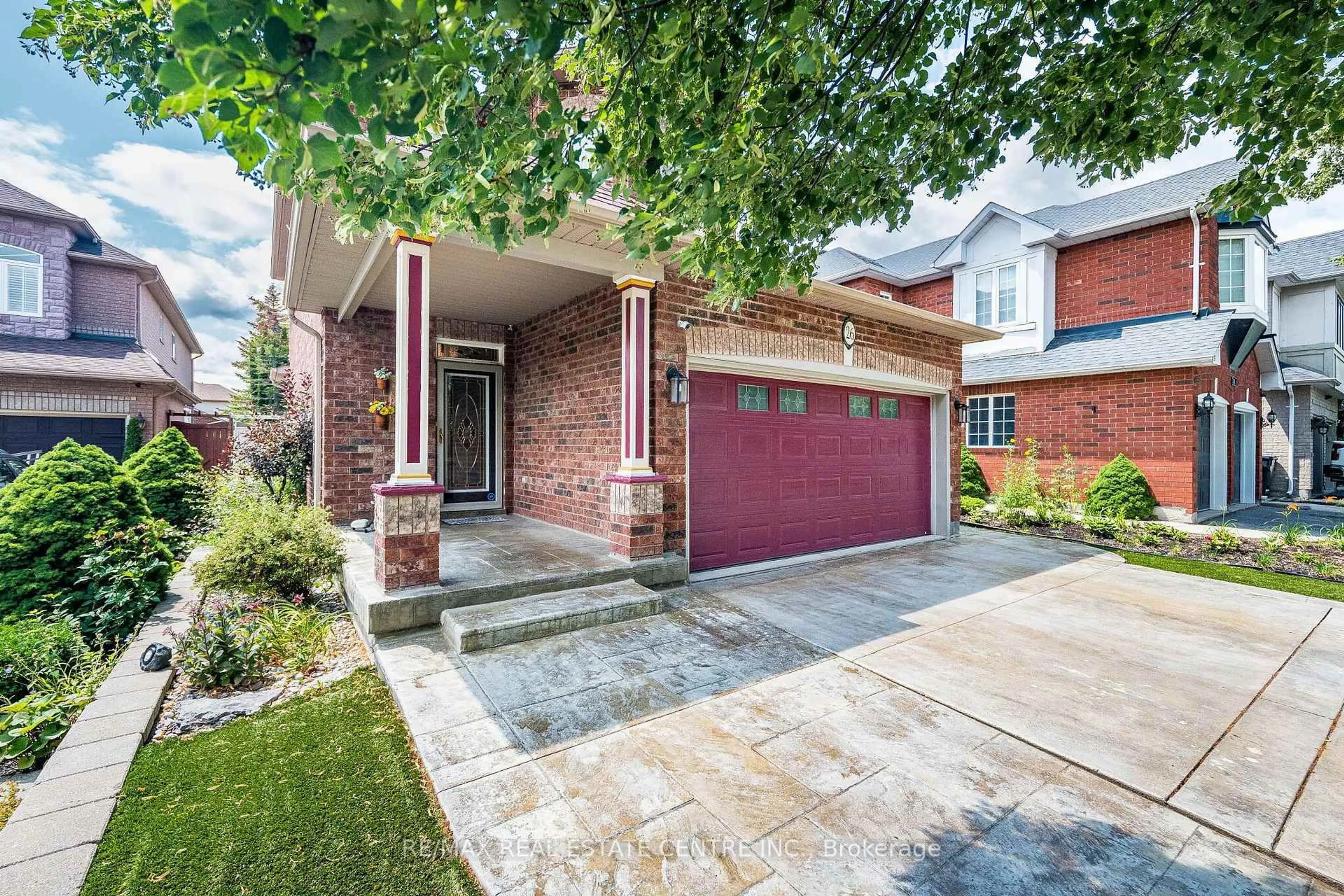 Home with brick exterior material, street for 26 Ballyduff Pl, Brampton Ontario L7A 1W6