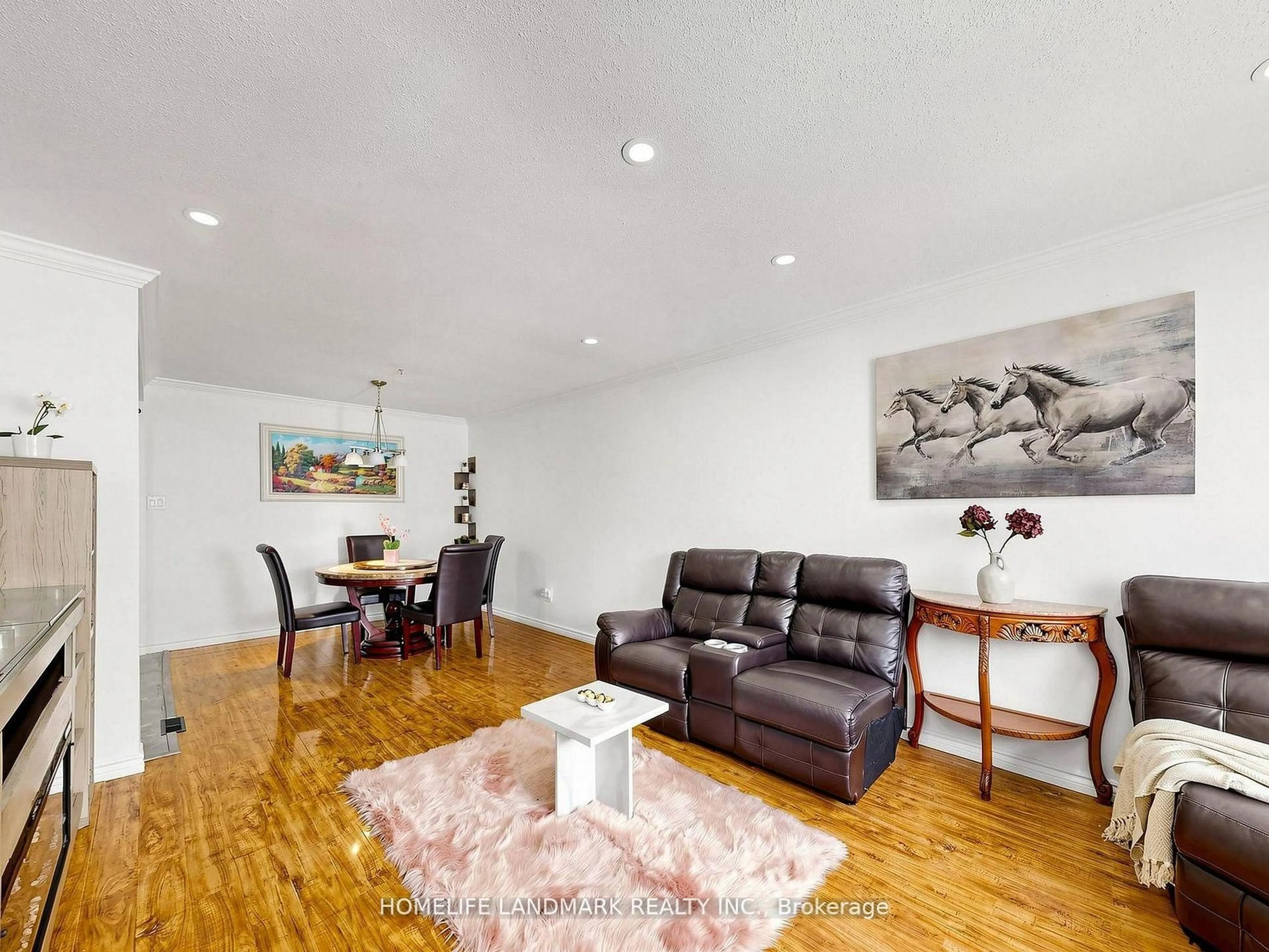 Living room with furniture, wood/laminate floor for 42 Glenmore Cres, Brampton Ontario L6S 1H8