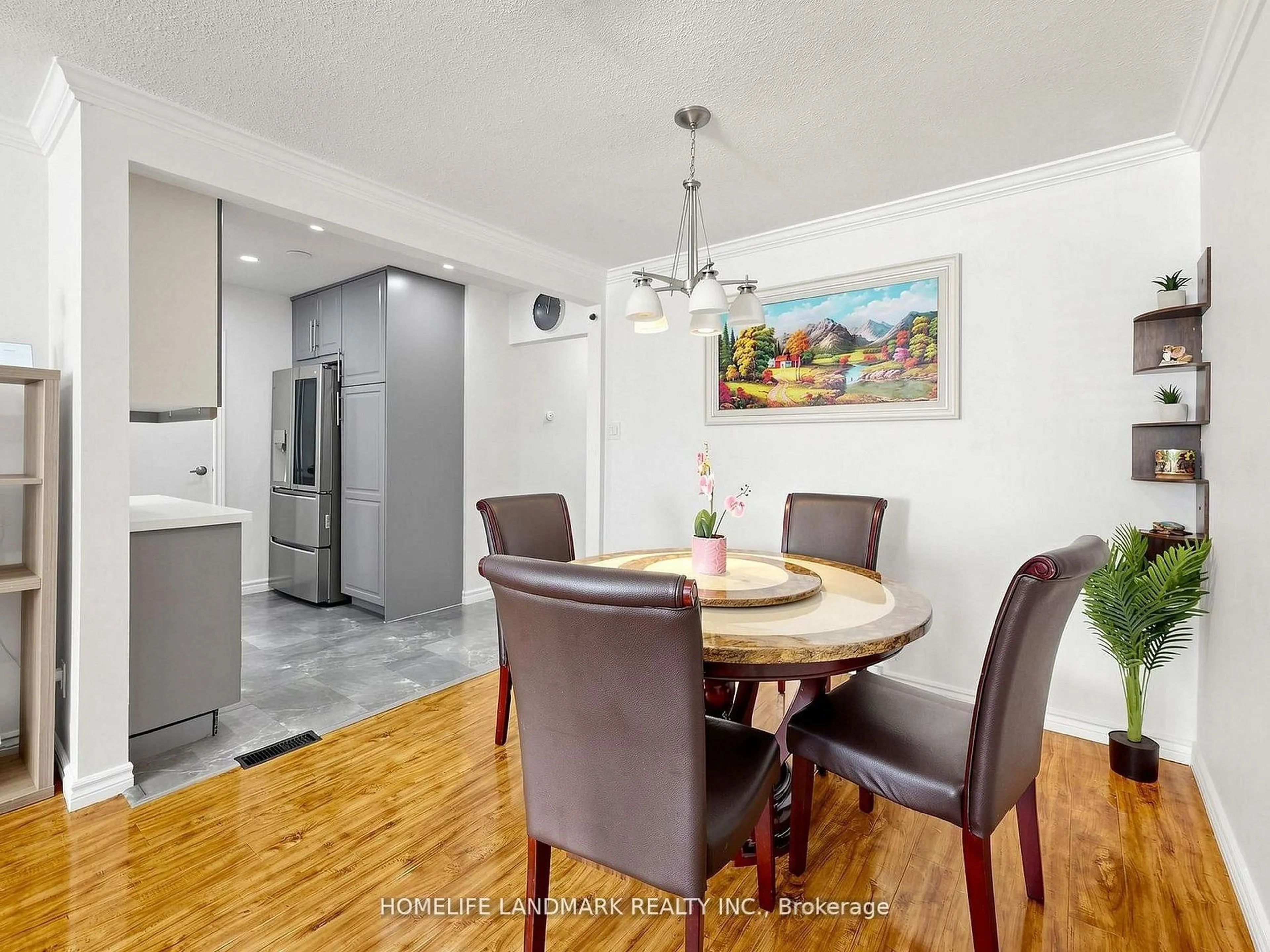 Dining room, wood/laminate floor for 42 Glenmore Cres, Brampton Ontario L6S 1H8