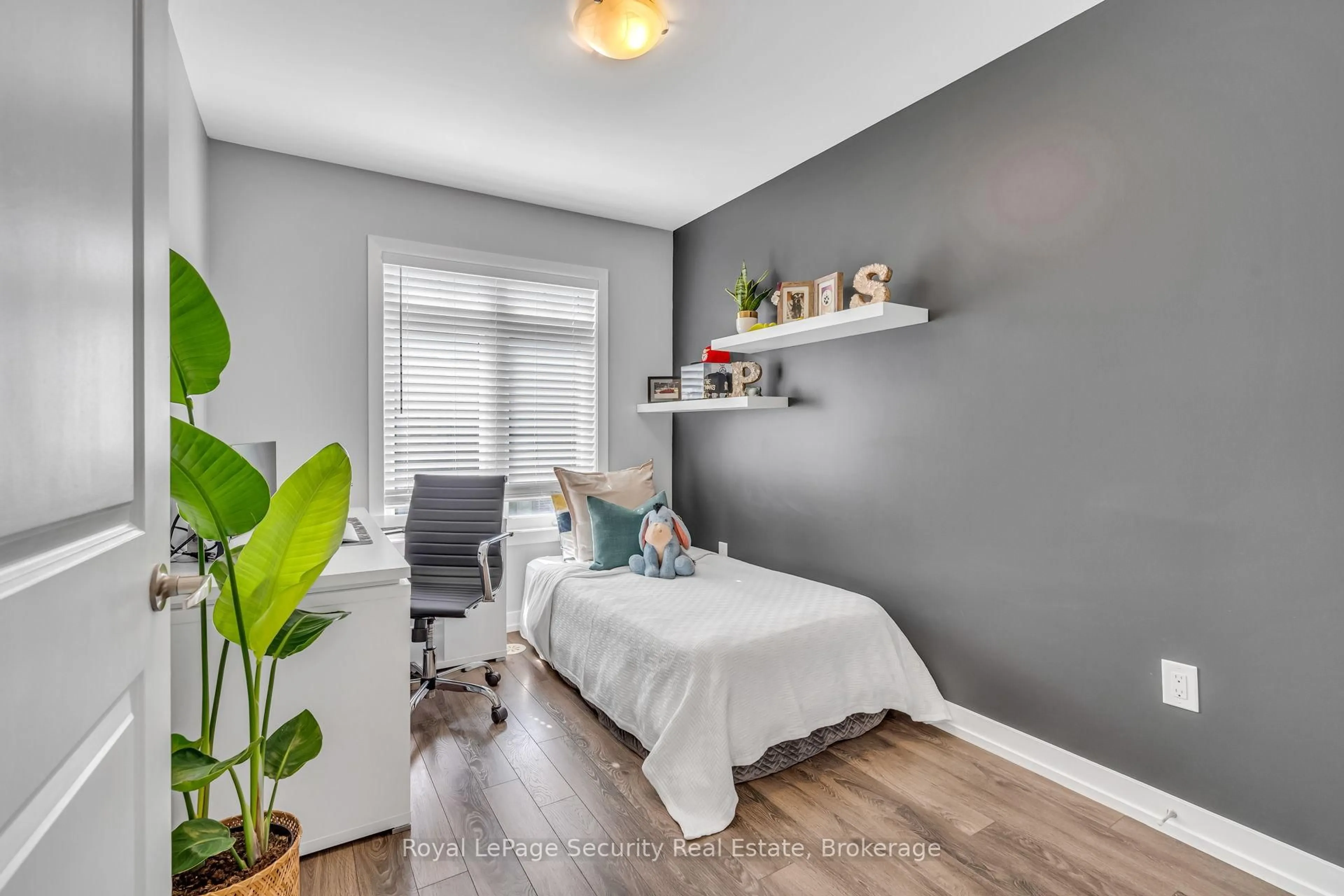Bedroom with bed, wood/laminate floor for 2315 Sheppard Ave #61, Toronto Ontario M9M 3A4