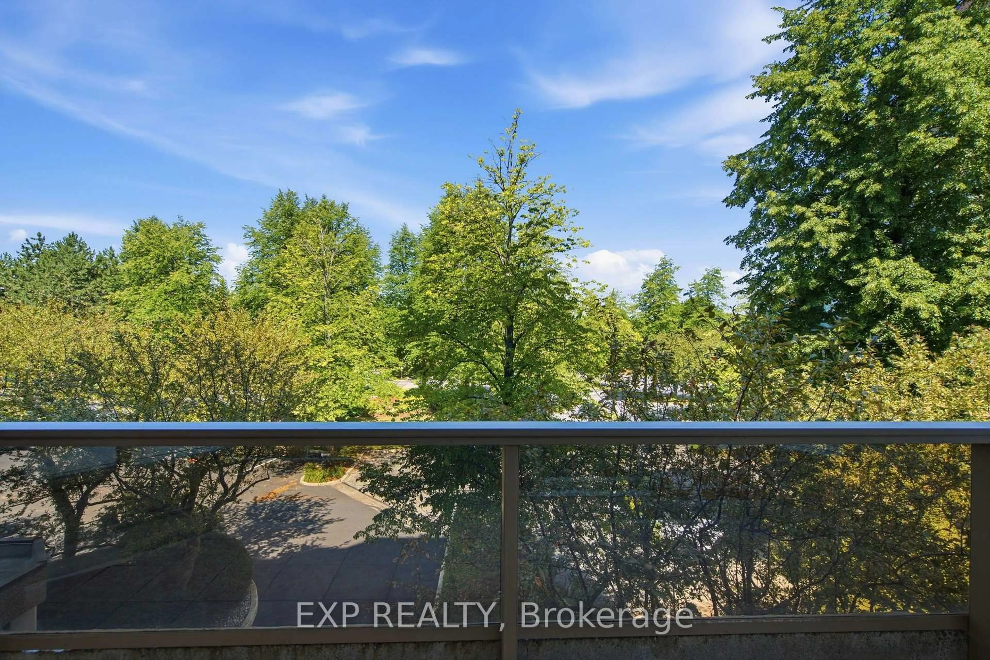 A pic from outside/outdoor area/front of a property/back of a property/a pic from drone, forest/trees view for 1903 Pilgrims Way #302, Oakville Ontario L6M 2X1