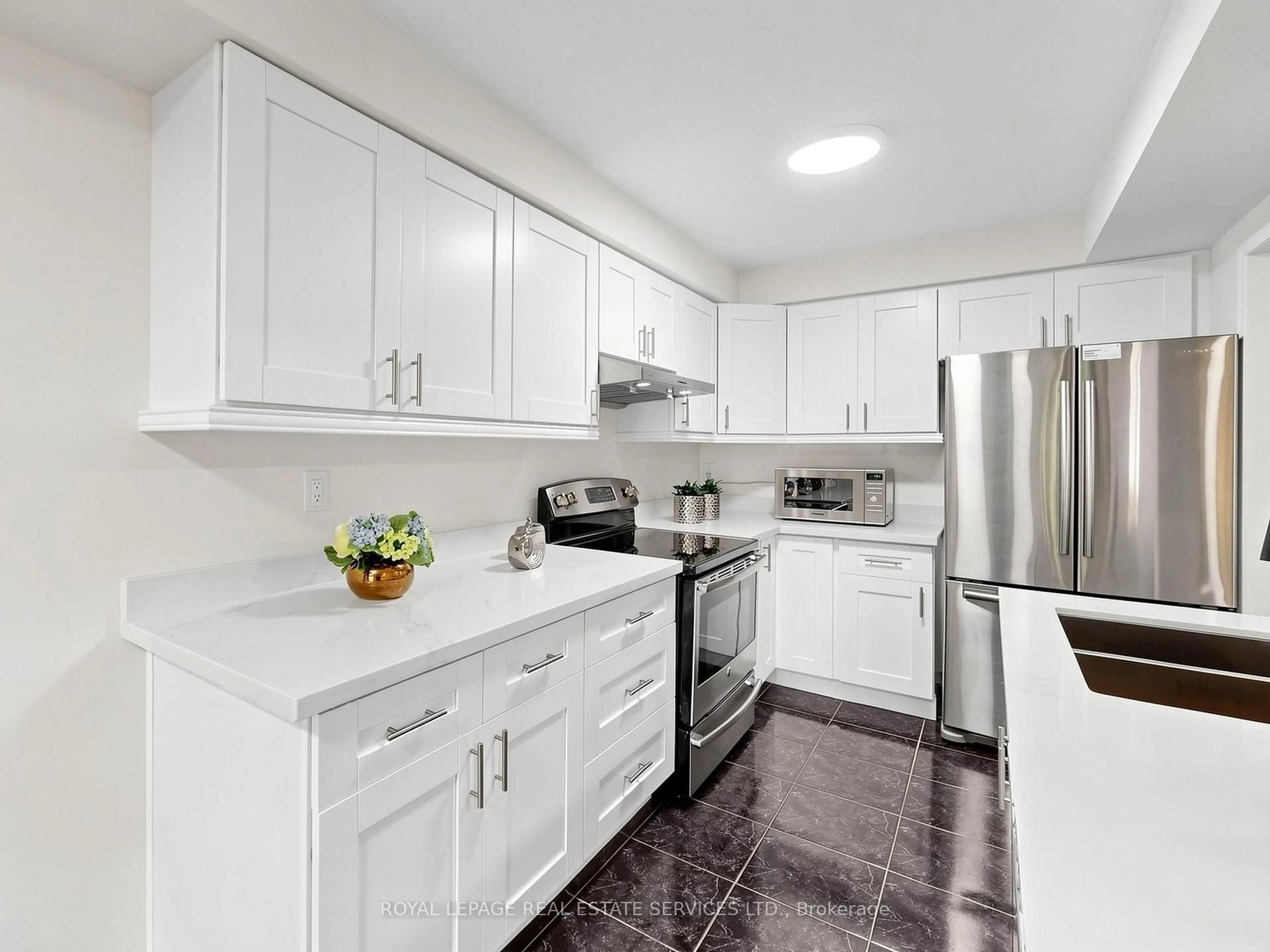 Standard kitchen, ceramic/tile floor for 1575 South Parade Crt #11, Mississauga Ontario L5M 6E9